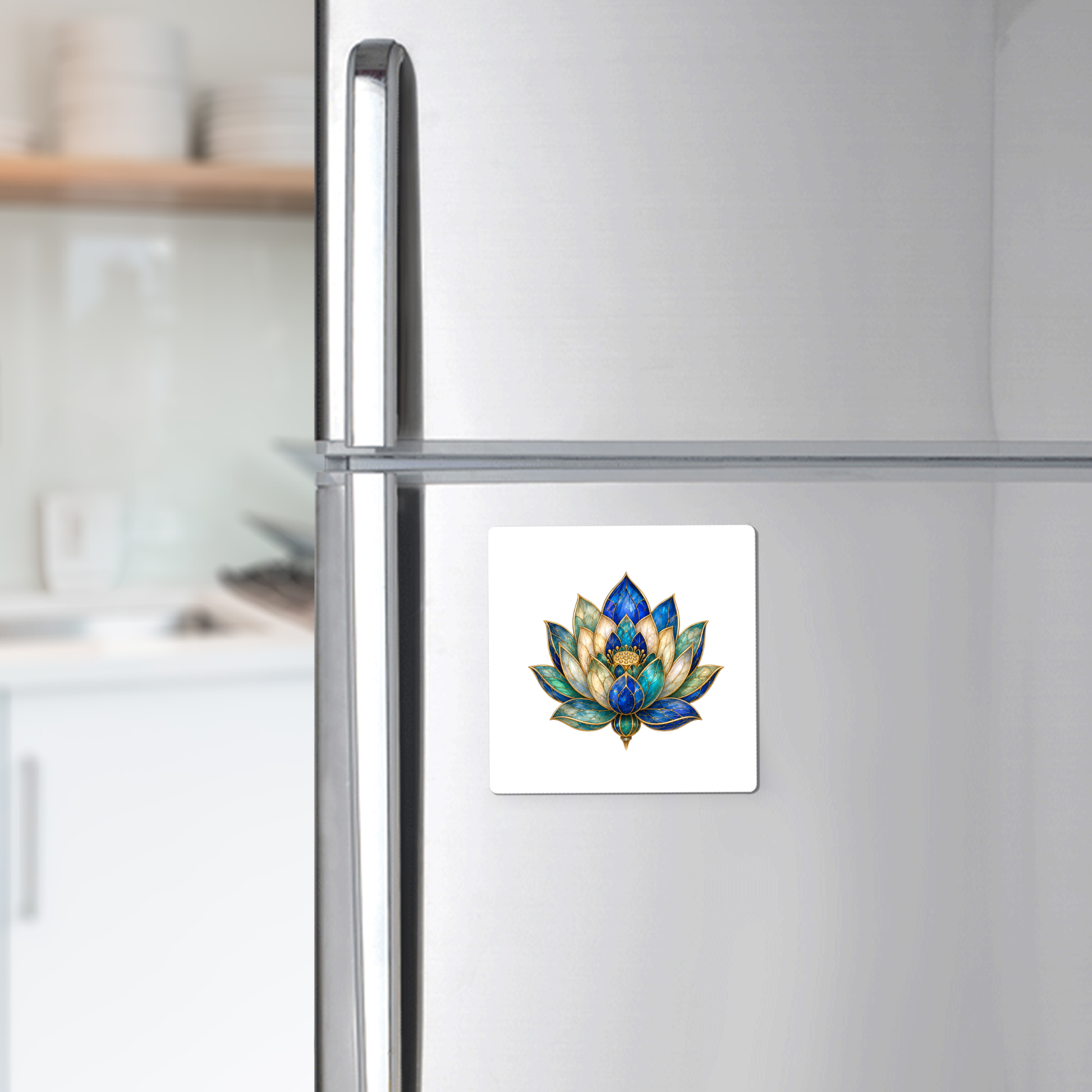A refrigerator in a kitchen features the Lapis Bloom Magnet | Egyptian Lotus Art by Mirabilia Boutique on its door, adding a touch of botanical decor. White shelves with dishes are visible in the background.