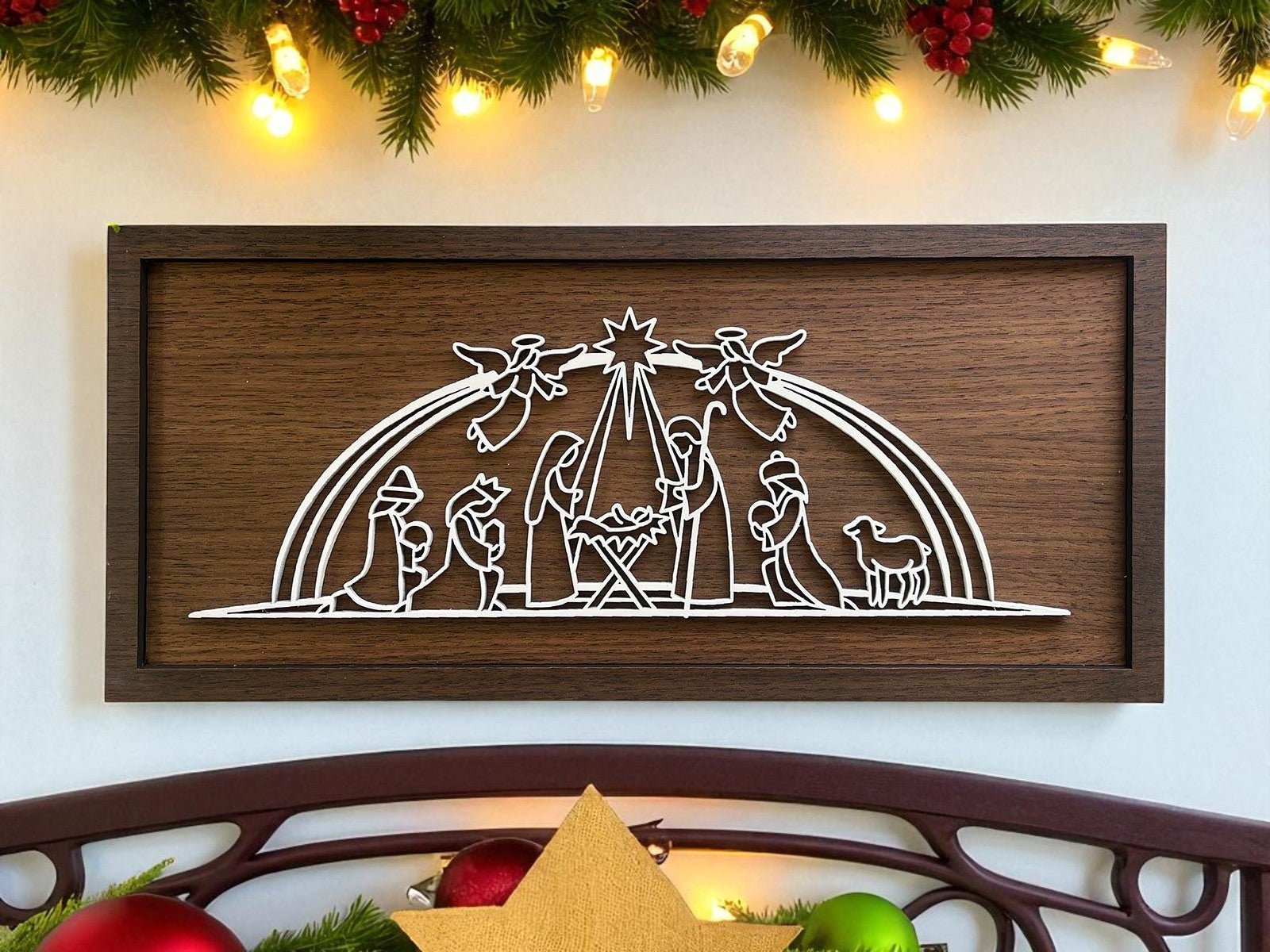 The Large Nativity Scene Sign by Mirabilia Boutique is an 18x8 handmade, laser-cut Christmas decor featuring Mary, Joseph, baby Jesus, wise men, shepherds, lambs, and angels under a star on a classic brown background.
