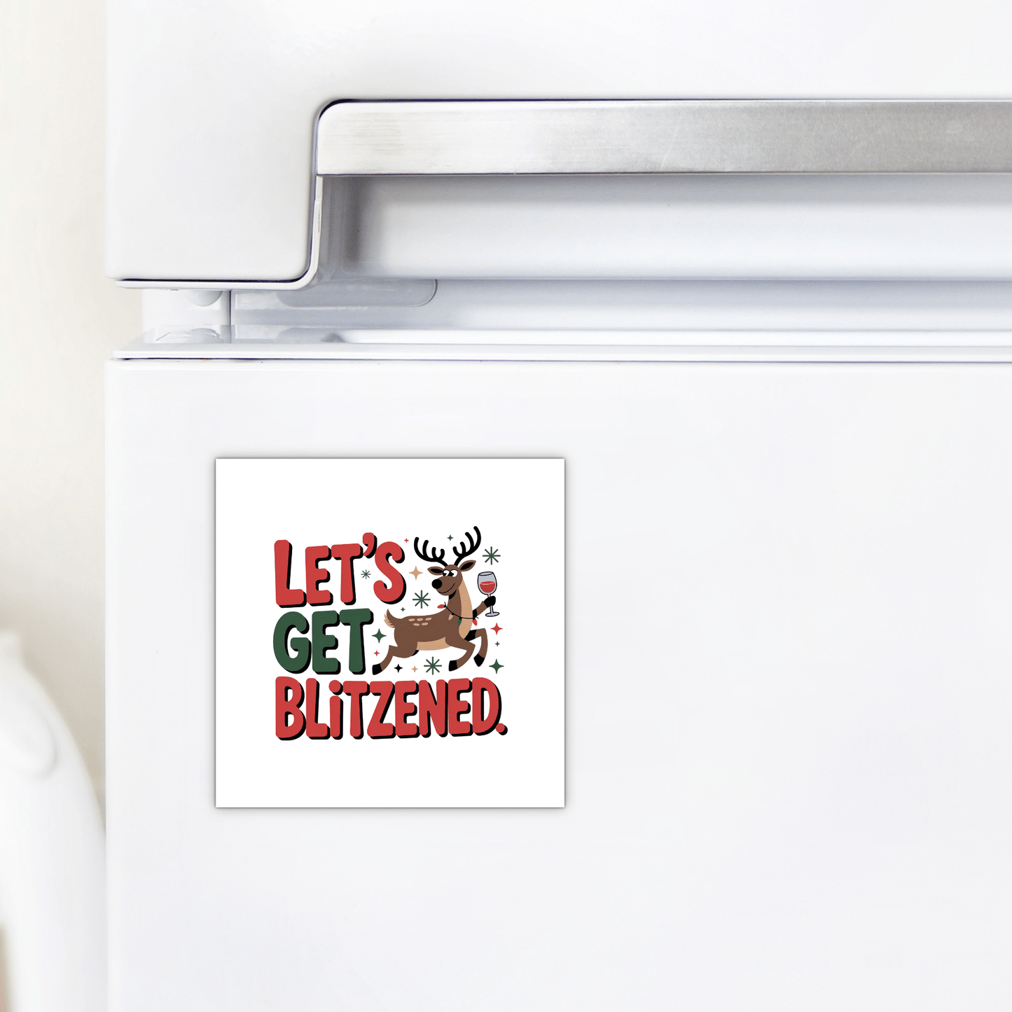 The Let’s Get Blitzened Magnet by Mirabilia Boutique adds festive cheer to your kitchen, featuring a reindeer in a Santa hat with a wine glass and “LET’S GET BLITZENED” in red and green, perfect as funny Christmas fridge decor.