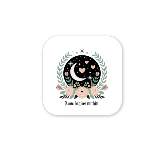 The Love Begins Within Magnet by Mirabilia Boutique features a crescent moon, stars, and hearts on black with laurel branches and pink flowers, plus the phrase "Love begins within"—a perfect celestial floral self-love gift.