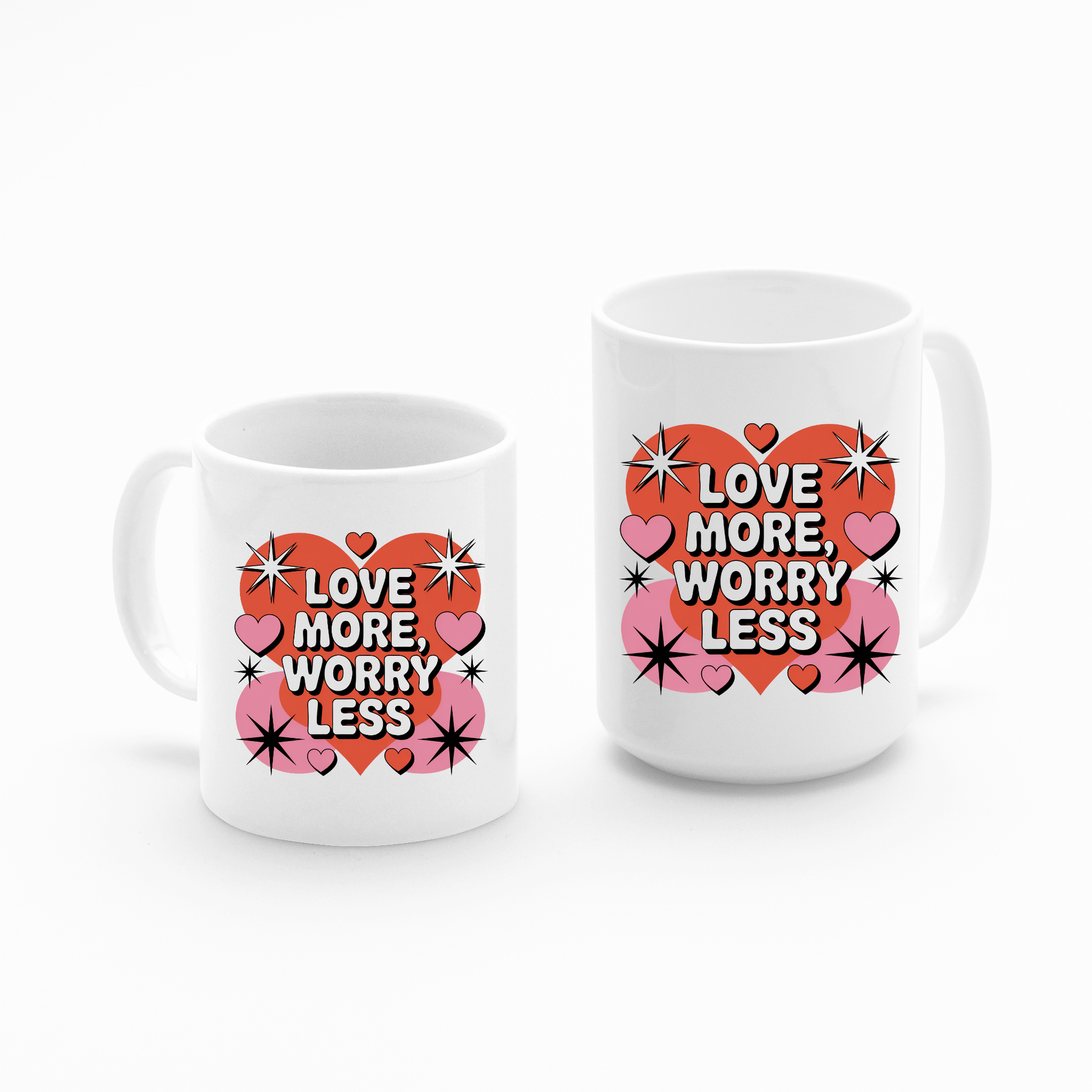 The Love More Worry Less Mug by Mirabilia Boutique is a retro white coffee cup with pink and red hearts, black stars, and "LOVE MORE, WORRY LESS"—a perfect Valentine’s Day gift.