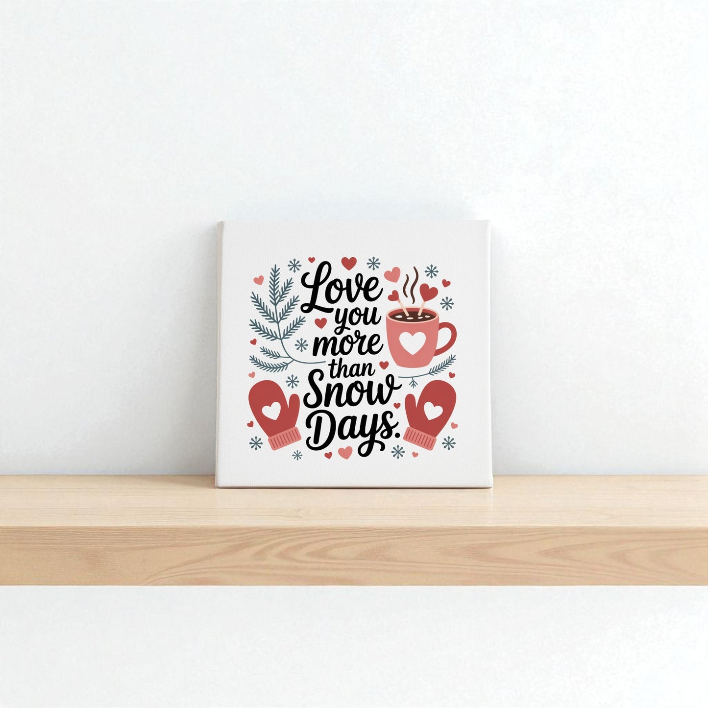 The Love You More Than Snow Days Print by Mirabilia Boutique features mittens, a mug, pine branches, and snowflakes—ideal as winter wall art décor or a romantic holiday gift.