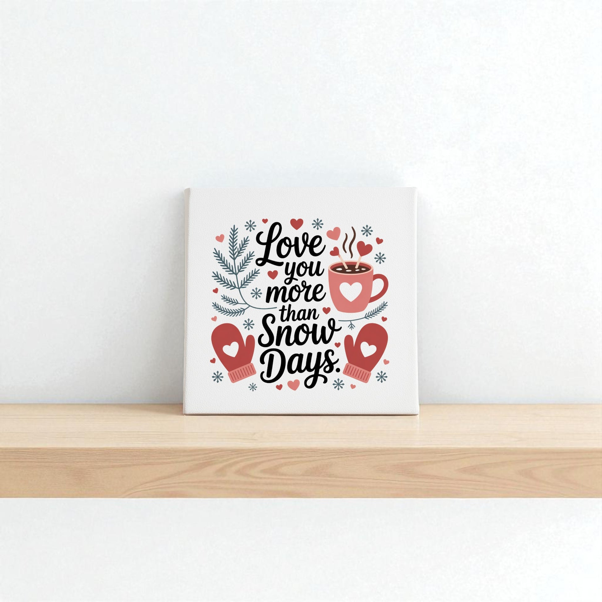 The Love You More Than Snow Days Print by Mirabilia Boutique features mittens, a mug, pine branches, and snowflakes—ideal as winter wall art décor or a romantic holiday gift.