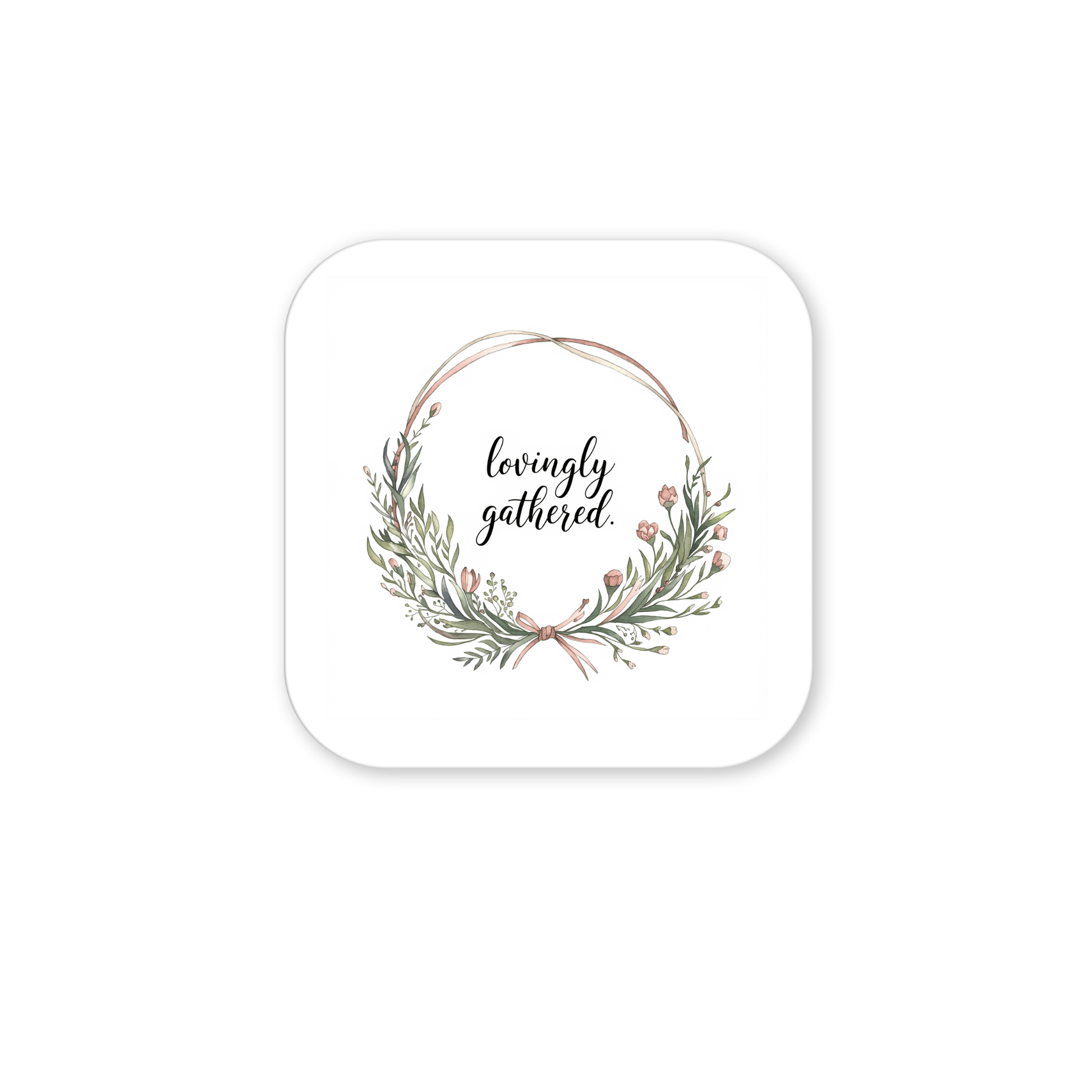 The Lovingly Gathered Magnet – Floral Wreath Quote for Fridge by Mirabilia Boutique features green leaves and pink flowers encircling “lovingly gathered” in script, making it a charming farmhouse decor accent for your kitchen.