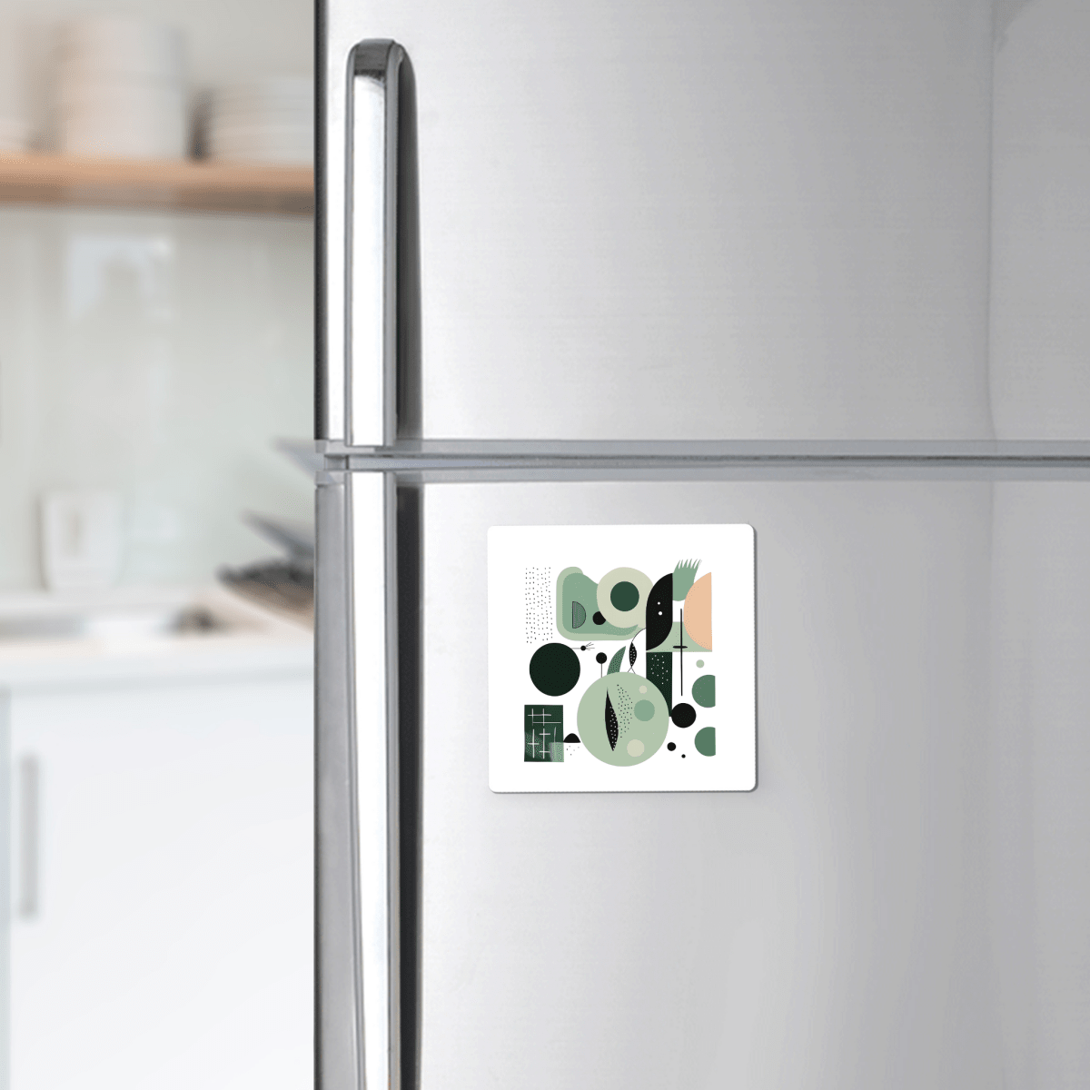 The Spring Geometry Mid Century Modern Magnet by Mirabilia Boutique adds a pop of green, black, and peach geometric style to your stainless steel fridge—perfect as a bright spring home accessory for any modern kitchen.