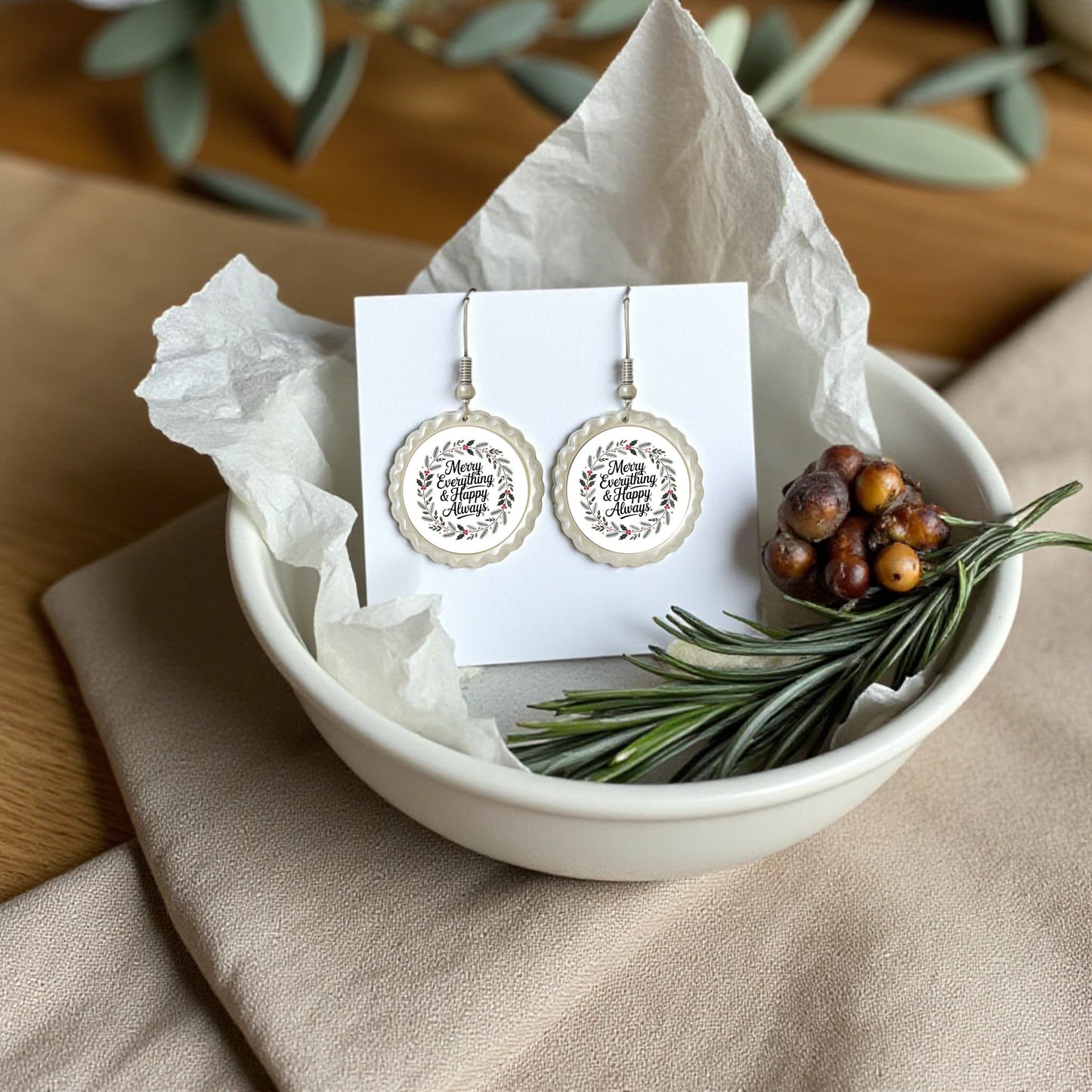 The Merry Everything Earrings from Mirabilia Boutique feature engraved floral designs and come beautifully displayed—an ideal festive holiday gift for her.