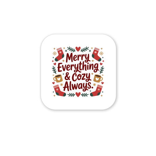 The Merry Everything & Cozy Always Magnet by Mirabilia Boutique is a festive holiday fridge decor featuring the phrase, red stockings, hearts, stars, mugs, and green leaves on a white background—perfect as a stocking stuffer.