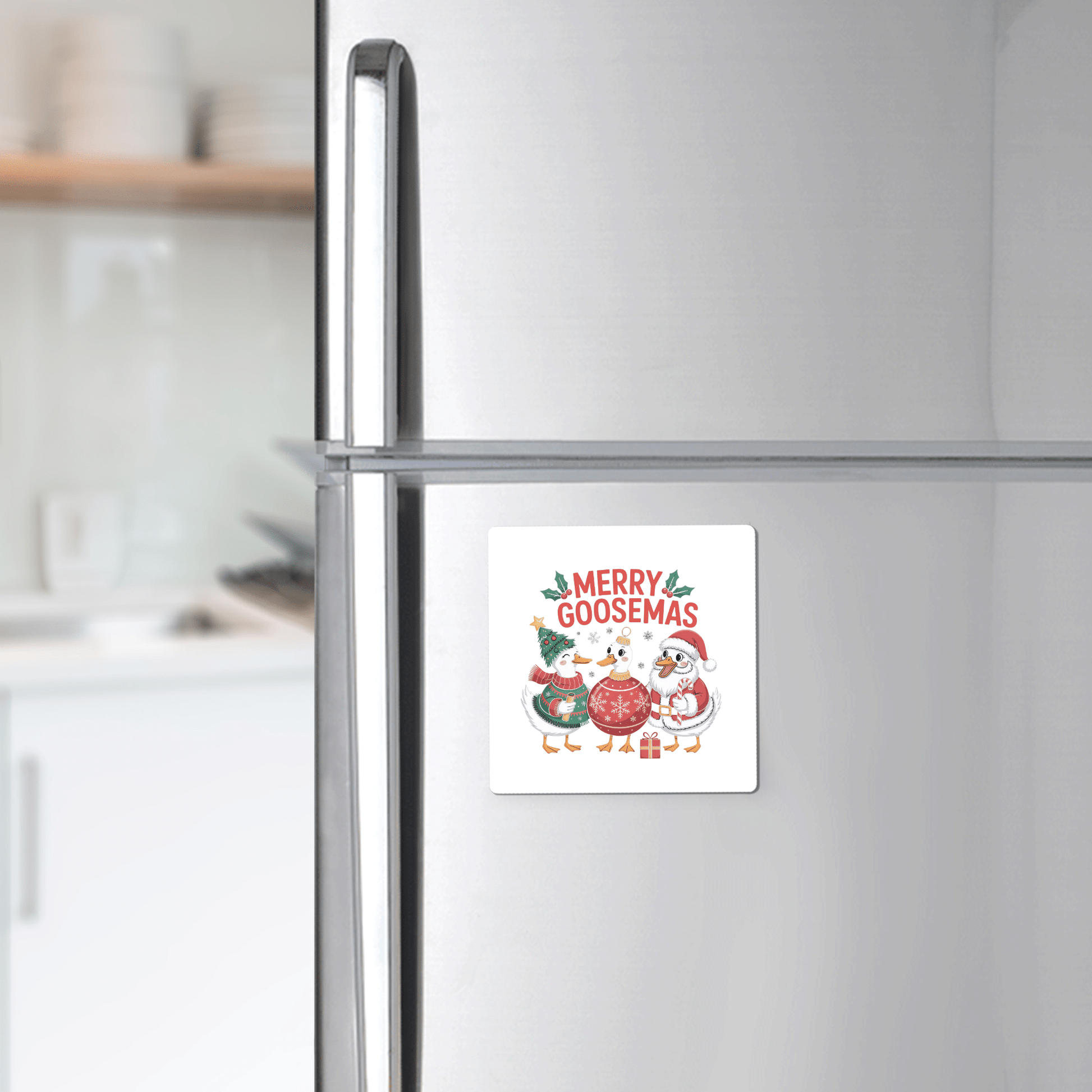 A kitchen fridge displays the Merry Goosemas Magnet by Mirabilia Boutique—a funny Christmas goose gift featuring cartoon geese in festive attire, perfect for adding cheerful holiday decor to your home.