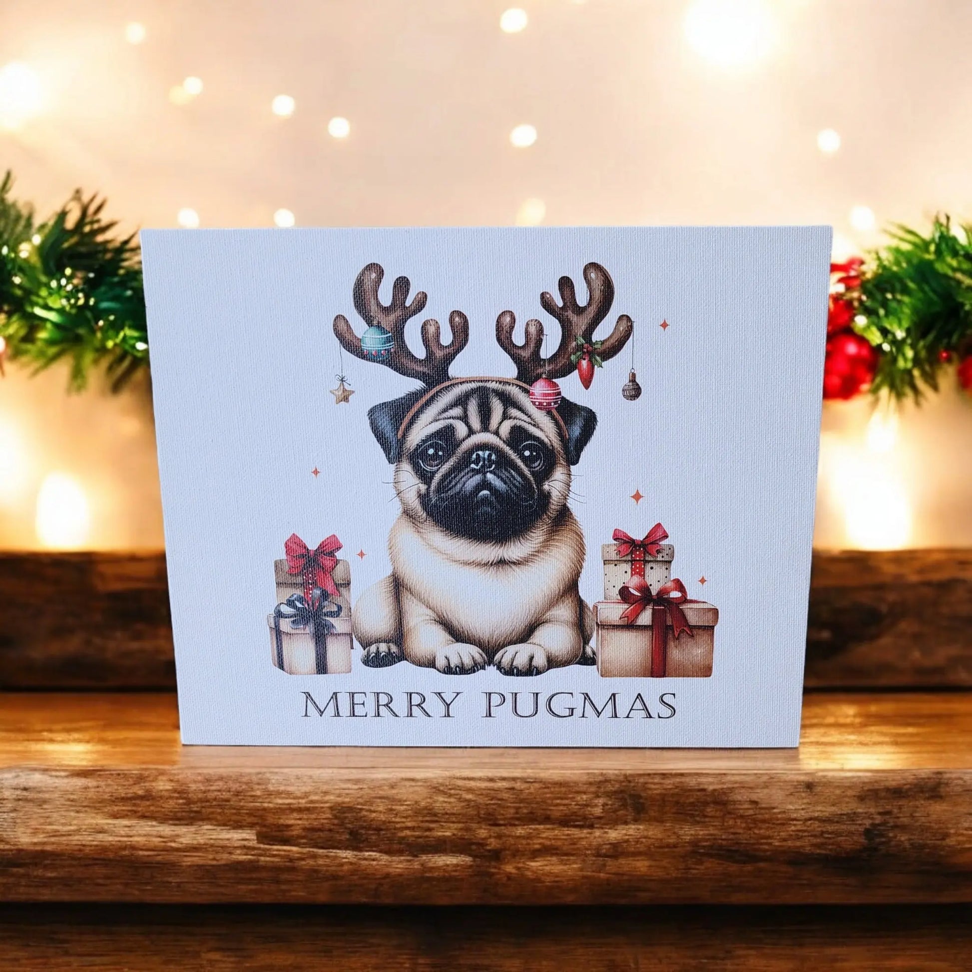 Mirabilia Boutique's Merry Pugmas 10x8 Canvas Sign showcases a festive pug wearing antlers decorated with ornaments and Christmas bows, seated before a garland of greenery and twinkling lights. Ideal for holiday decor or framing as wall art, this charming piece features the cheerful message "MERRY PUGMAS" at the bottom.