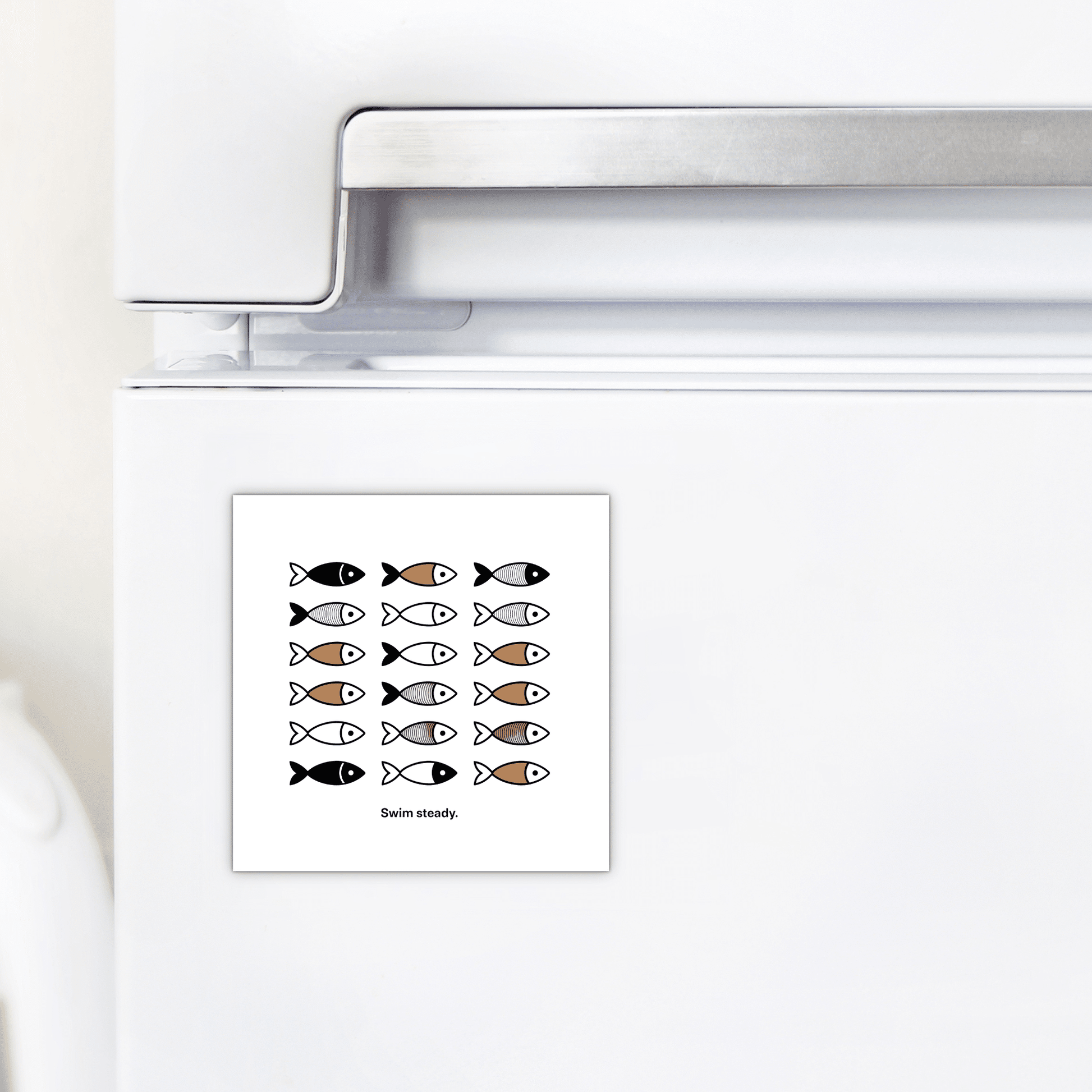 Decorate your fridge with the Swim Steady Magnet – Minimalist Motivational Fridge Art from Mirabilia Boutique, featuring 15 simple black, tan, and brown fish illustrations and the message “Swim steady”—perfect for minimalist decor or encouragement gifts.
