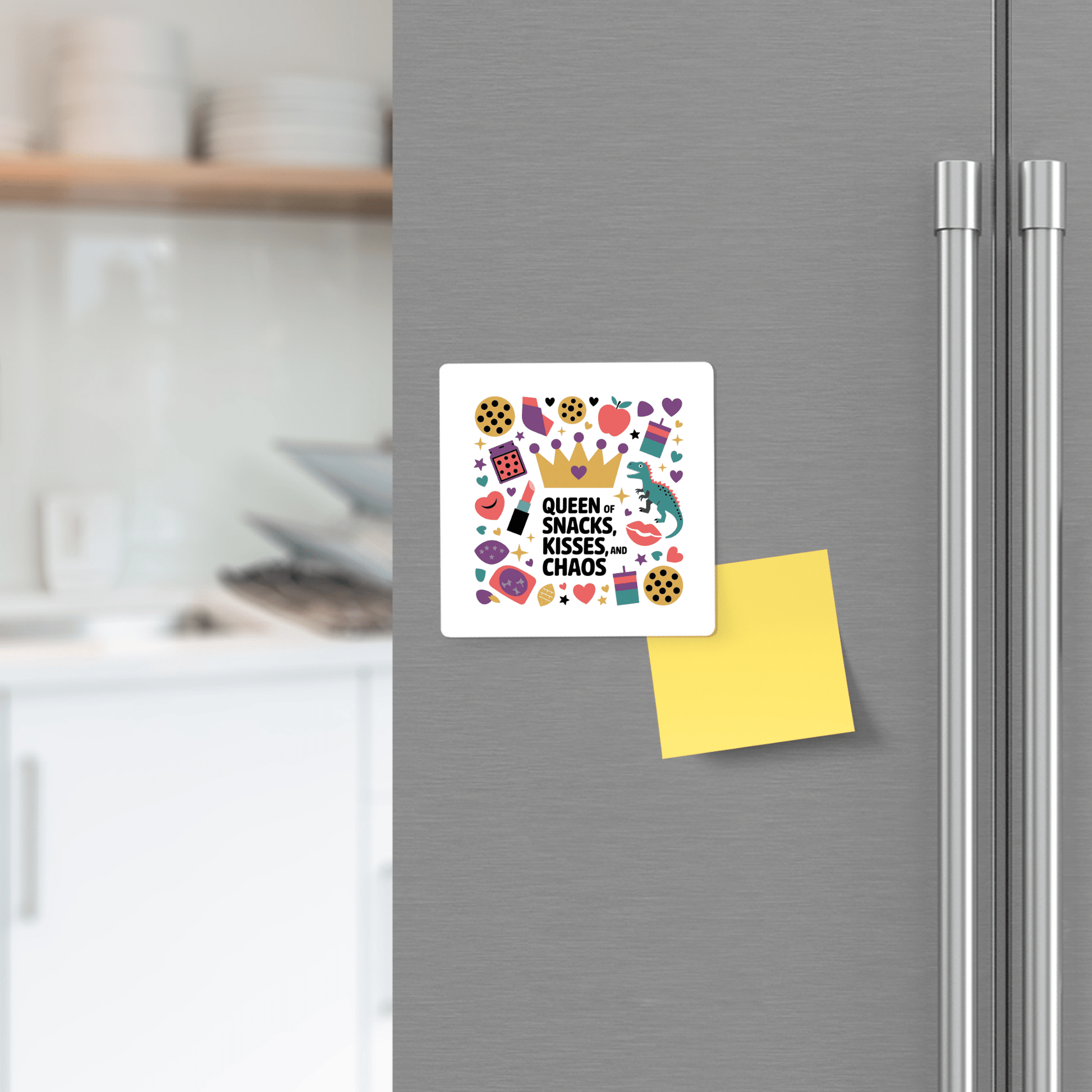 A Mirabilia Boutique Queen of Snacks Magnet – Funny Colorful Mom Life Gift, featuring “Queen of snacks, kisses & chaos” and colorful icons, decorates a fridge beside a yellow sticky note—perfect for moms.