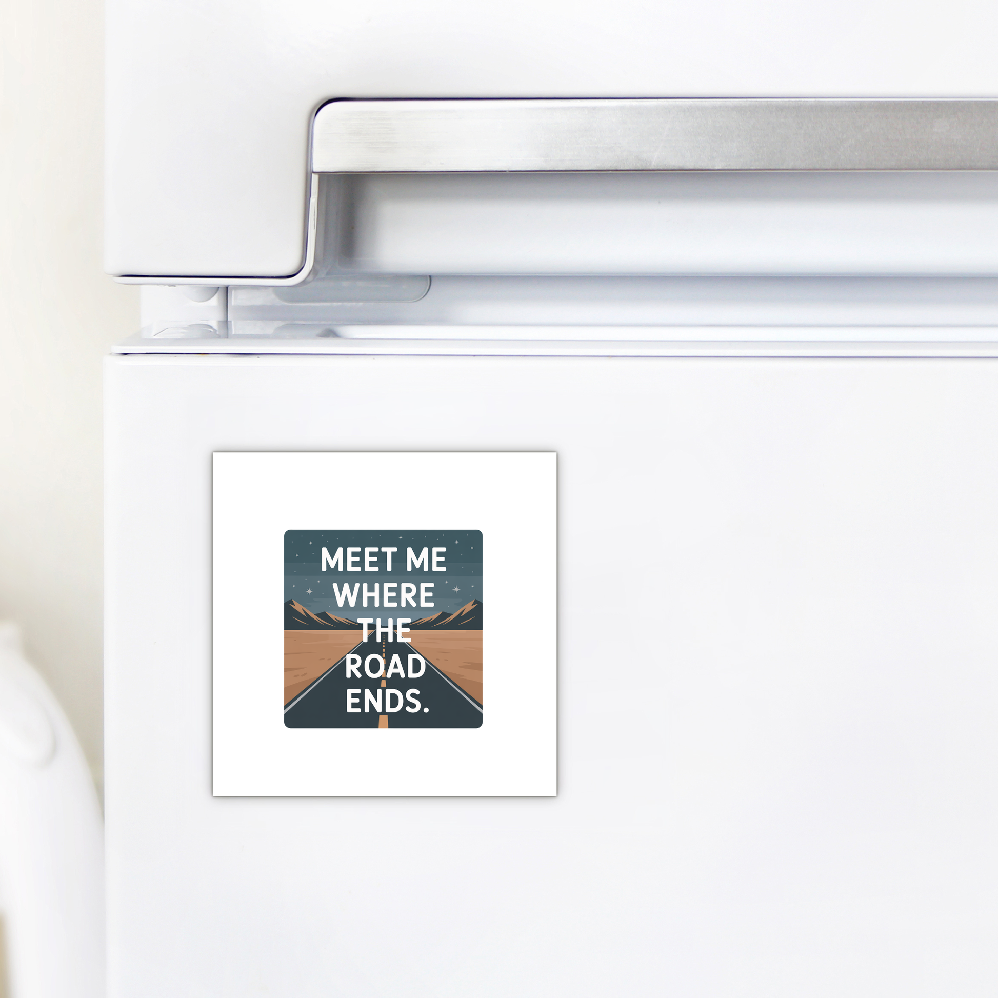 The Meet Me Where the Road Ends Magnet by Mirabilia Boutique features a road-to-mountains night scene and inspiring text—perfect as a road trip gift or unique camper decor accent.