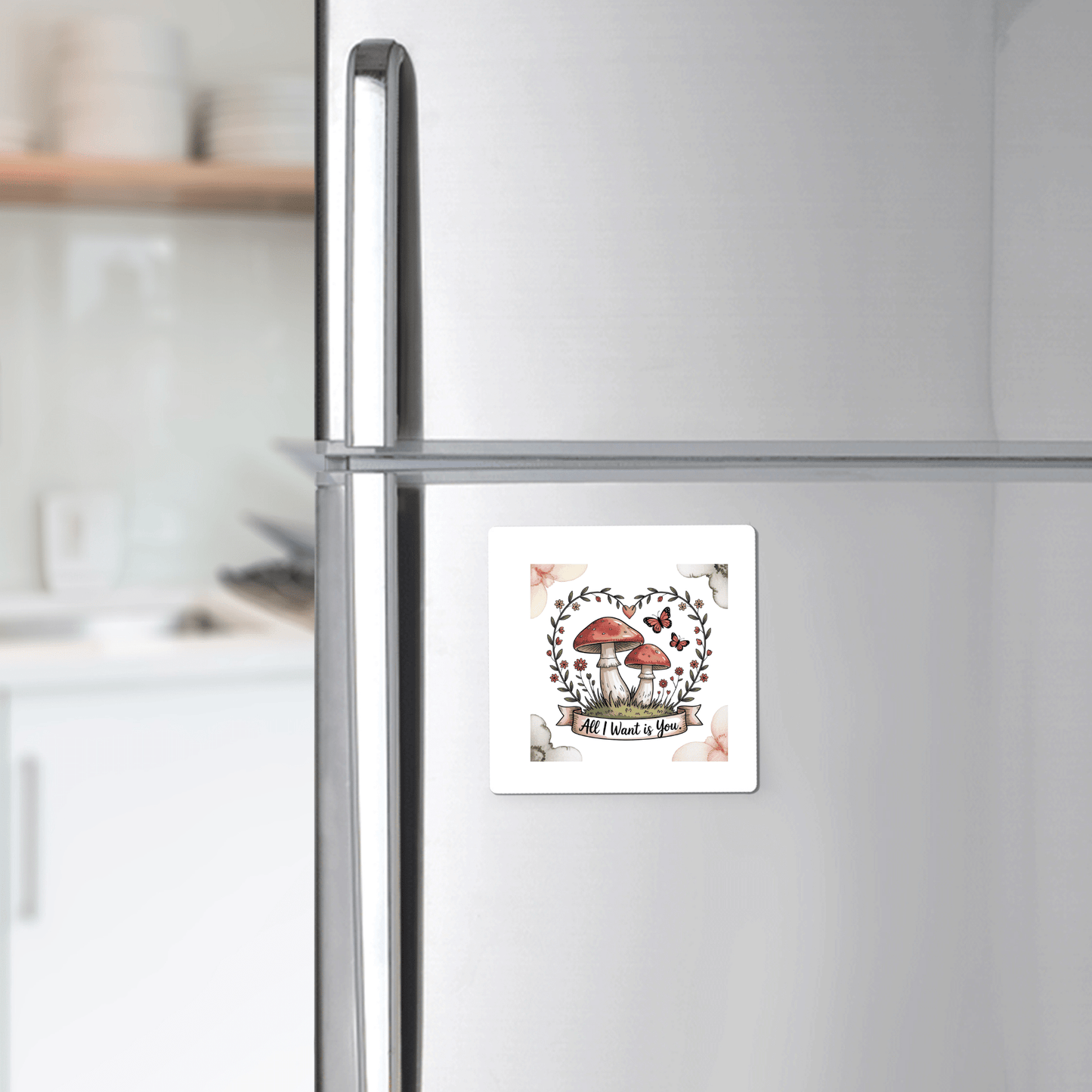 The Mushroom Love Magnet by Mirabilia Boutique features a charming nature design with heart-shaped wreath, making it a cute fridge decor piece—ideal for cottagecore style or as a thoughtful gift.