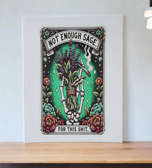 The Mirabilia Boutique's Humorous Sage Quote Wall Art Print for Home or Office Decor features a vibrant design of a hand holding sage, surrounded by flowers and stars. Set against a green background, it humorously displays the phrase "Not Enough Sage For This Shit." Perfectly placed on a wooden shelf, this witty artwork makes an ideal humorous gift.