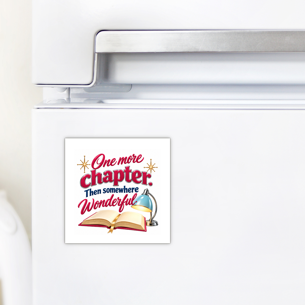 Square One More Chapter Book Lover Magnet | Chrome & Starlight on a white refrigerator, featuring the text “One more chapter. Then somewhere wonderful” above an illustration of an open book and a desk lamp.