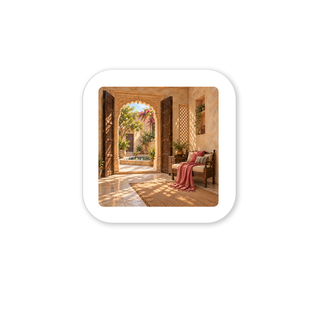 The Door Left Open Magnet | Sand & Saffron decorative hardboard magnet featuring a sunlit Mediterranean courtyard view through an open arched doorway, with a cushioned bench and a throw blanket in the foreground.