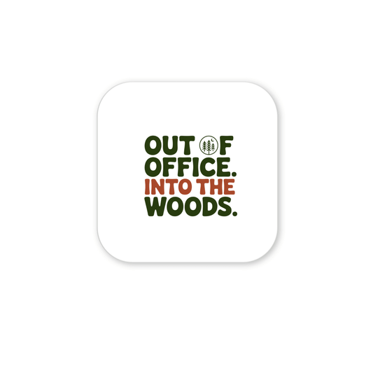 The Out of Office Into the Woods Magnet by Mirabilia Boutique features a white square with rounded corners, green and brown text, and a small tree in the "O"—a perfect adventure magnet for nature lovers or cabin decor.
