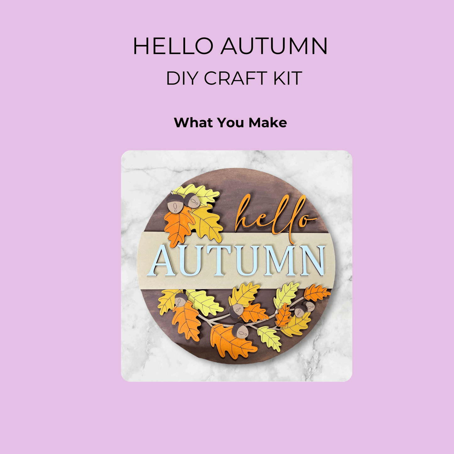 The Hello Autumn DIY Wall Sign Kit by Mirabilia Boutique lets you paint a round wooden sign with autumn leaves, acorns, and "hello AUTUMN" in script and block letters. Includes "What You Make" on a light purple background.