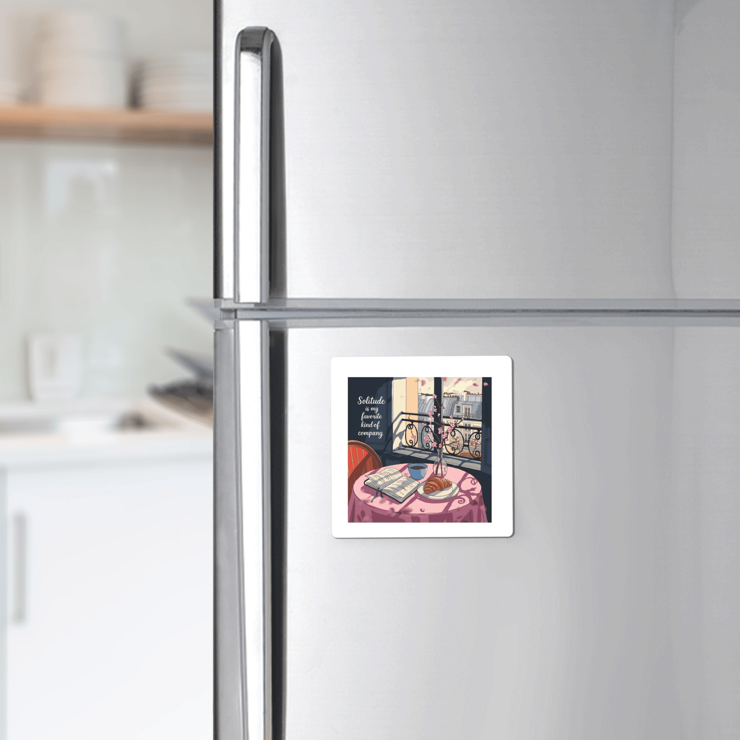 The Solitude Magnet – Paris Morning Still Life by Mirabilia Boutique features a handcrafted illustration of a cozy table with a teacup, book, and vase by a sunlit window, bringing Parisian apartment charm to your fridge.
