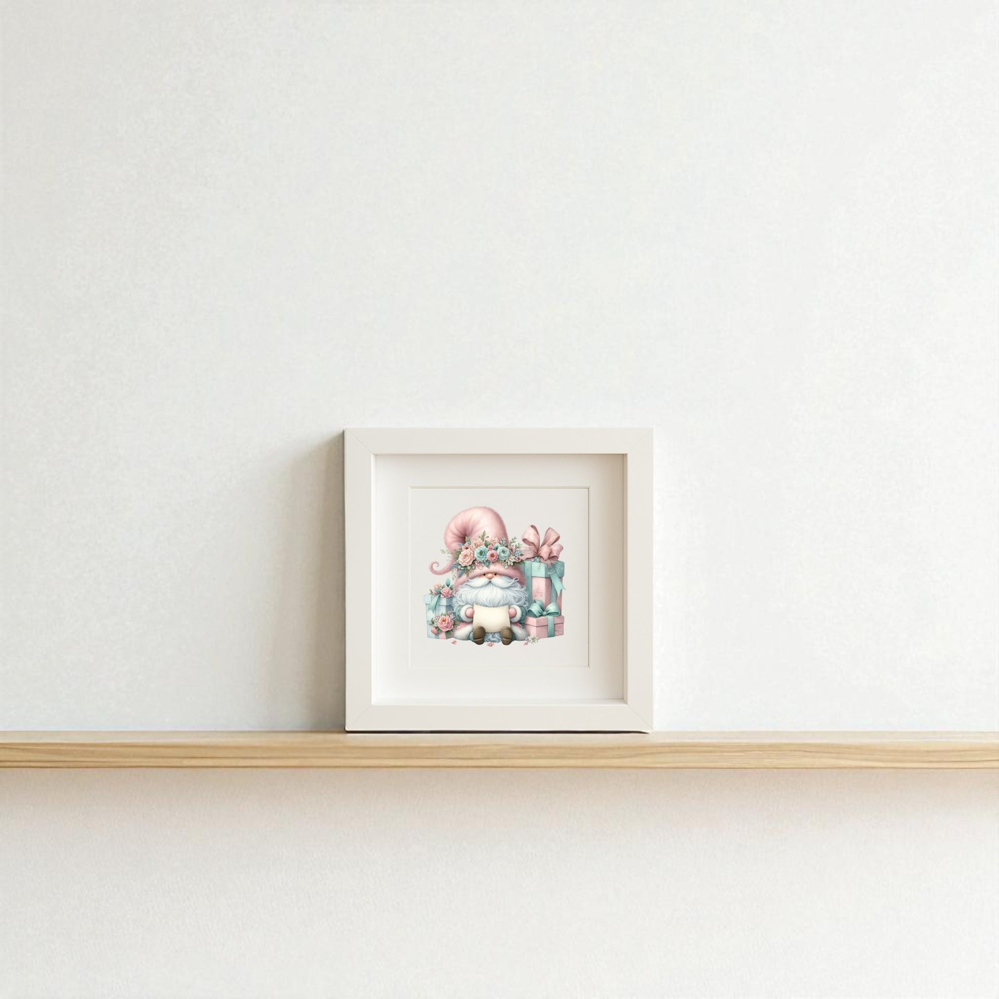 Mirabilia Boutique’s “Pastel Gnome with Gifts” holiday wall art is perfect winter decor for a nursery or kitchen—this framed illustration features a gnome in a pink hat with presents, adding festive charm to any space.