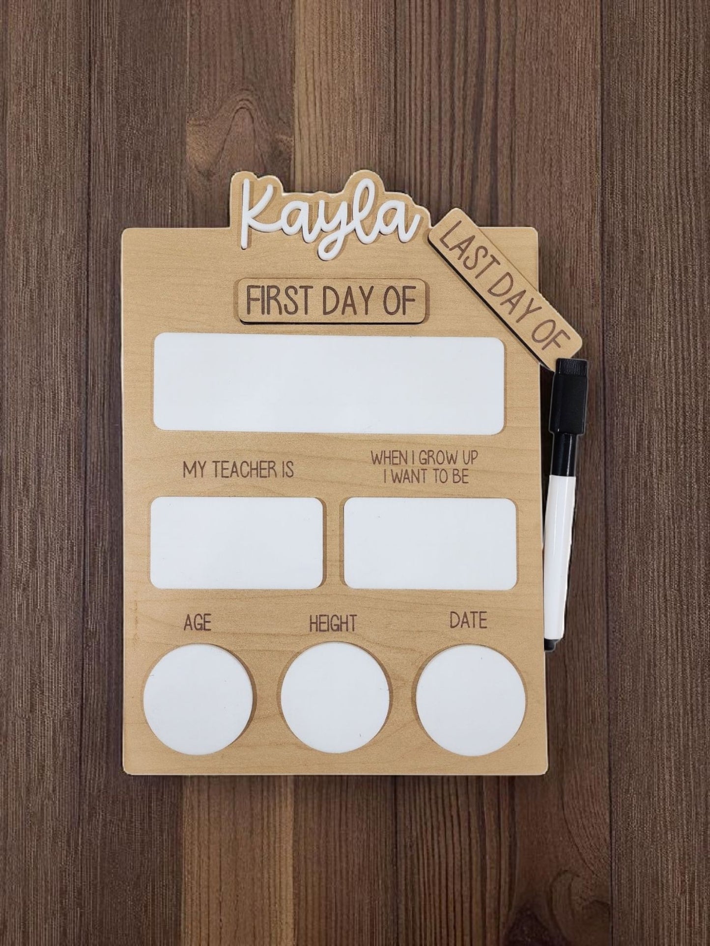 The Mirabilia Boutique Reusable School Board is a wooden sign with labeled sections for memories and an attached “Last Day Of” tag—a perfect personalized photo prop for capturing first and last days of school.