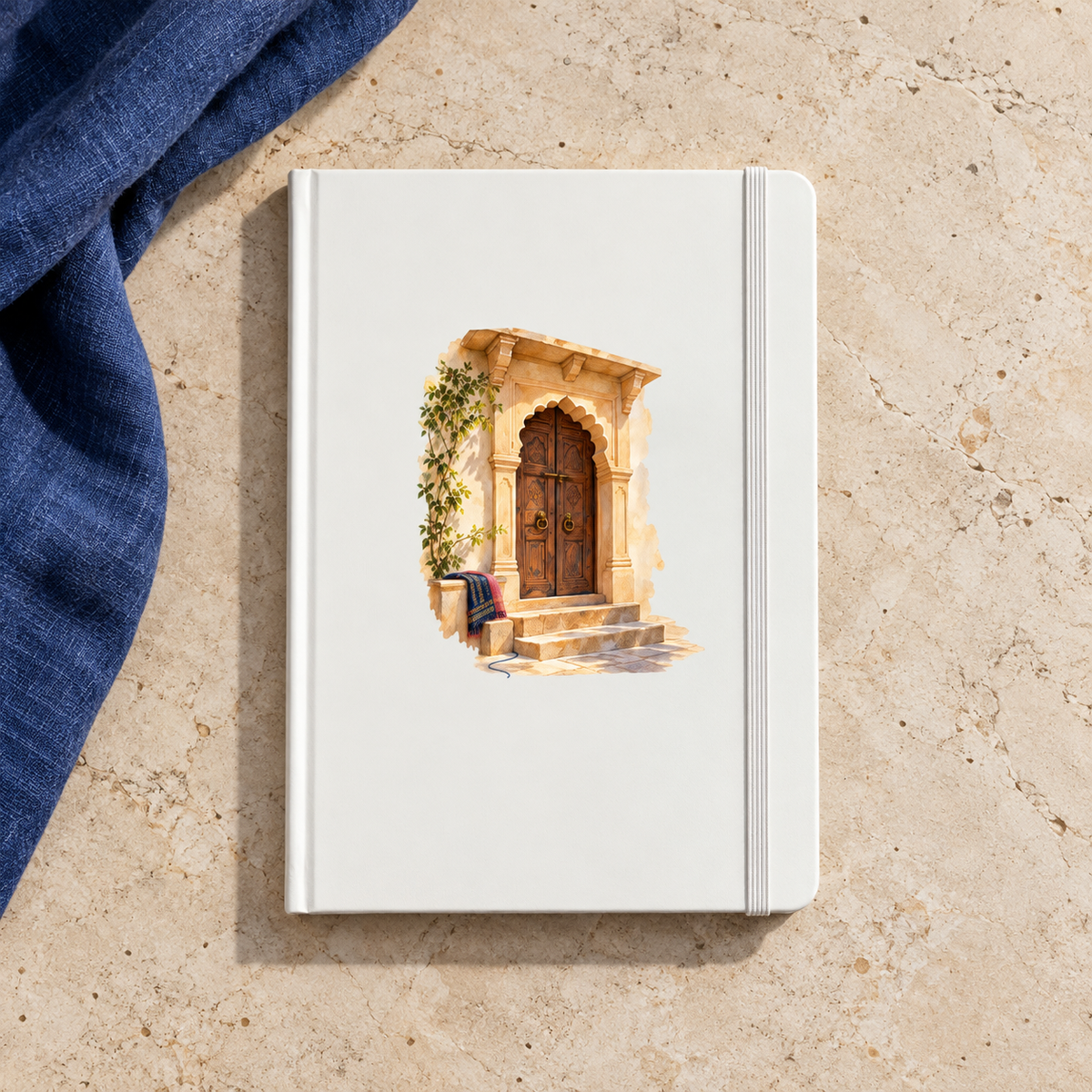 A House in the Margin A5 Journal | Sand & Saffron, a white watercolor journal featuring an illustration of an ornate wooden door set in a stone archway.