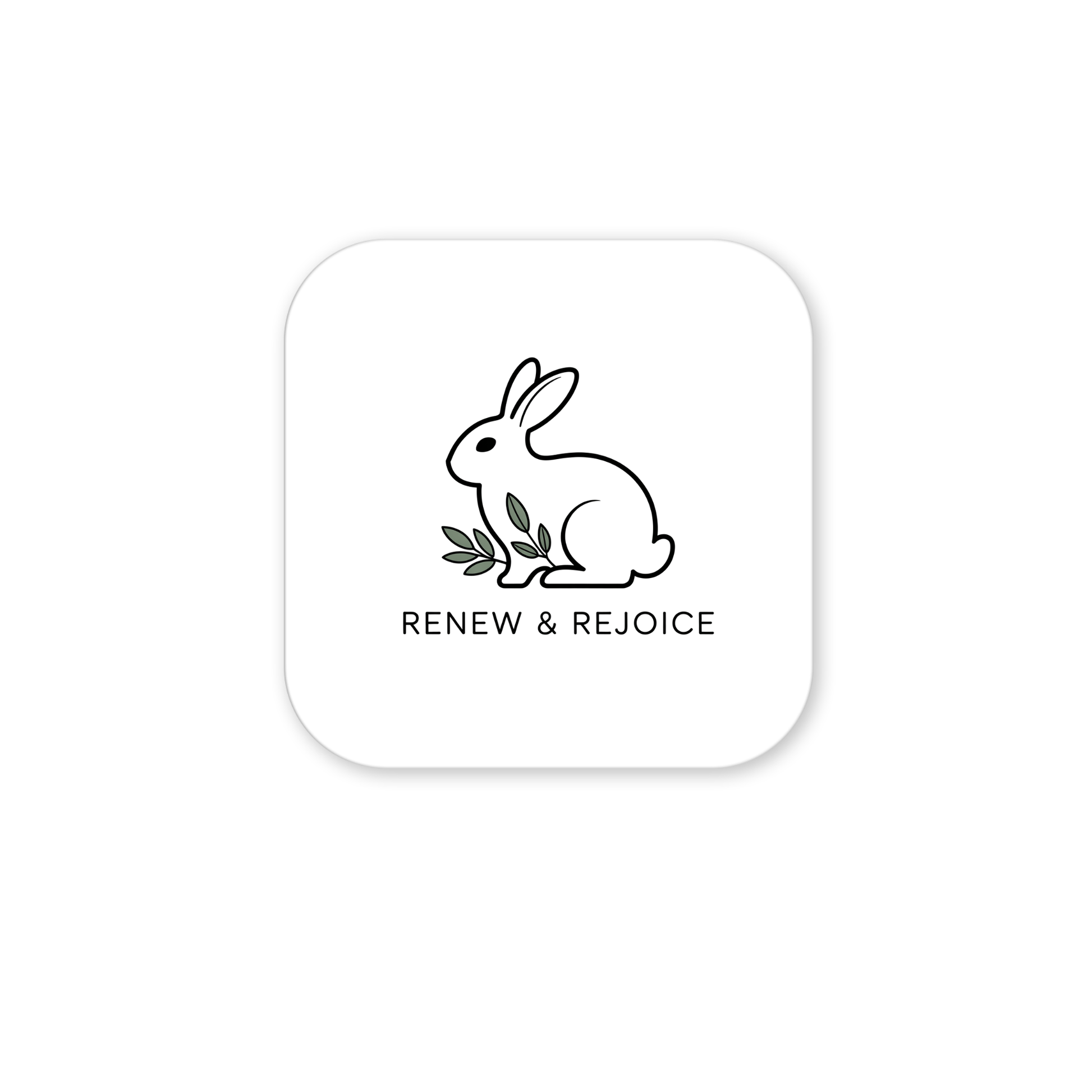 The Renew & Rejoice Magnet by Mirabilia Boutique features a minimalist bunny with green leaves and “RENEW & REJOICE” text on a rounded white square—perfect as charming spring décor or a mindfulness reminder.