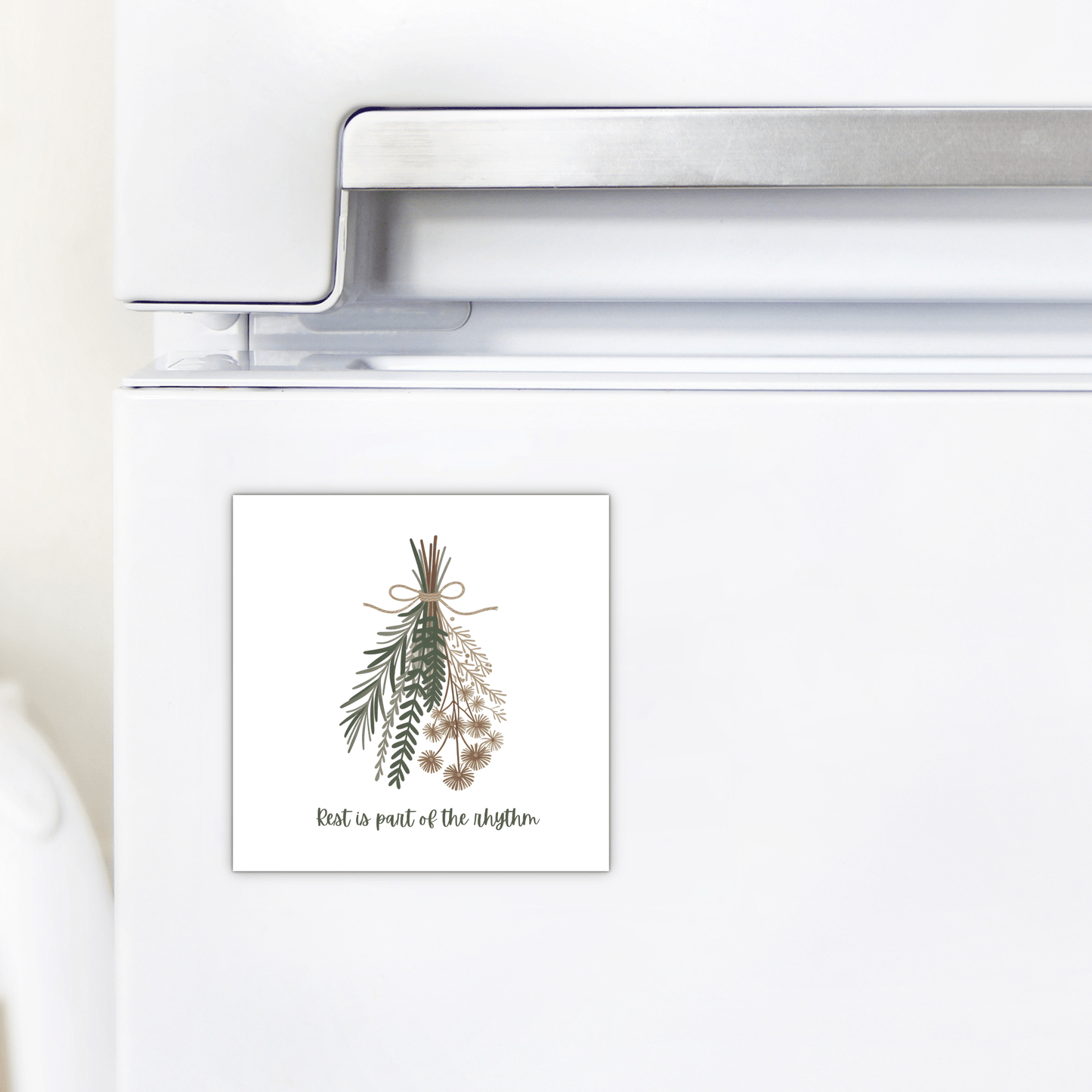 The Botanical Magnet | Rest Reminder by Mirabilia Boutique features a minimalist herbal sprig design and the phrase "Rest is part of the rhythm"—a unique fridge decor and thoughtful slow living gift.
