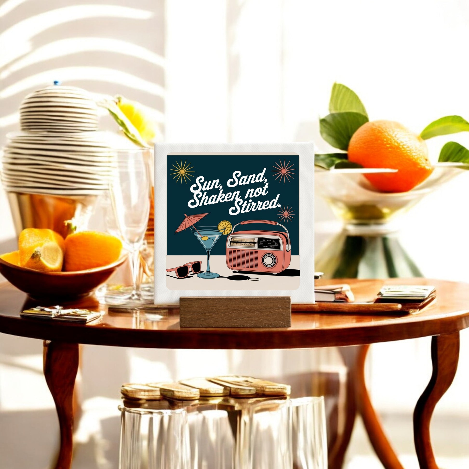 The MCM Sun, Sand, Shaken Not Stirred Mini Canvas by Mirabilia Boutique is a 4x4 retro sign with a cocktail, sunglasses, and vintage radio—perfect bar cart decor for summer style.