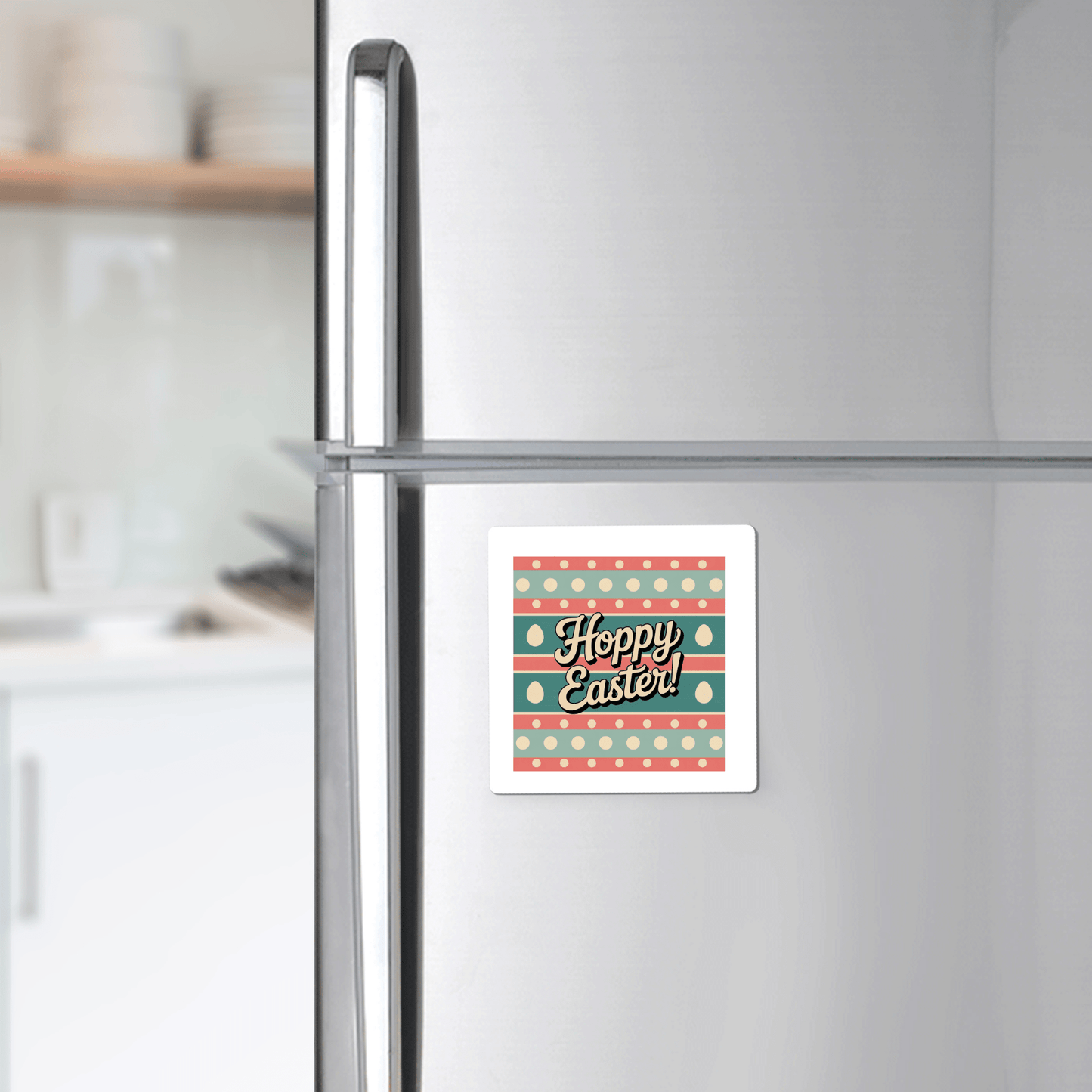 The Hoppy Easter Magnet – Retro Spring Egg Design by Mirabilia Boutique adds festive pastel polka dots and eggs to your stainless steel fridge, with a kitchen of shelves and dishes in the background.