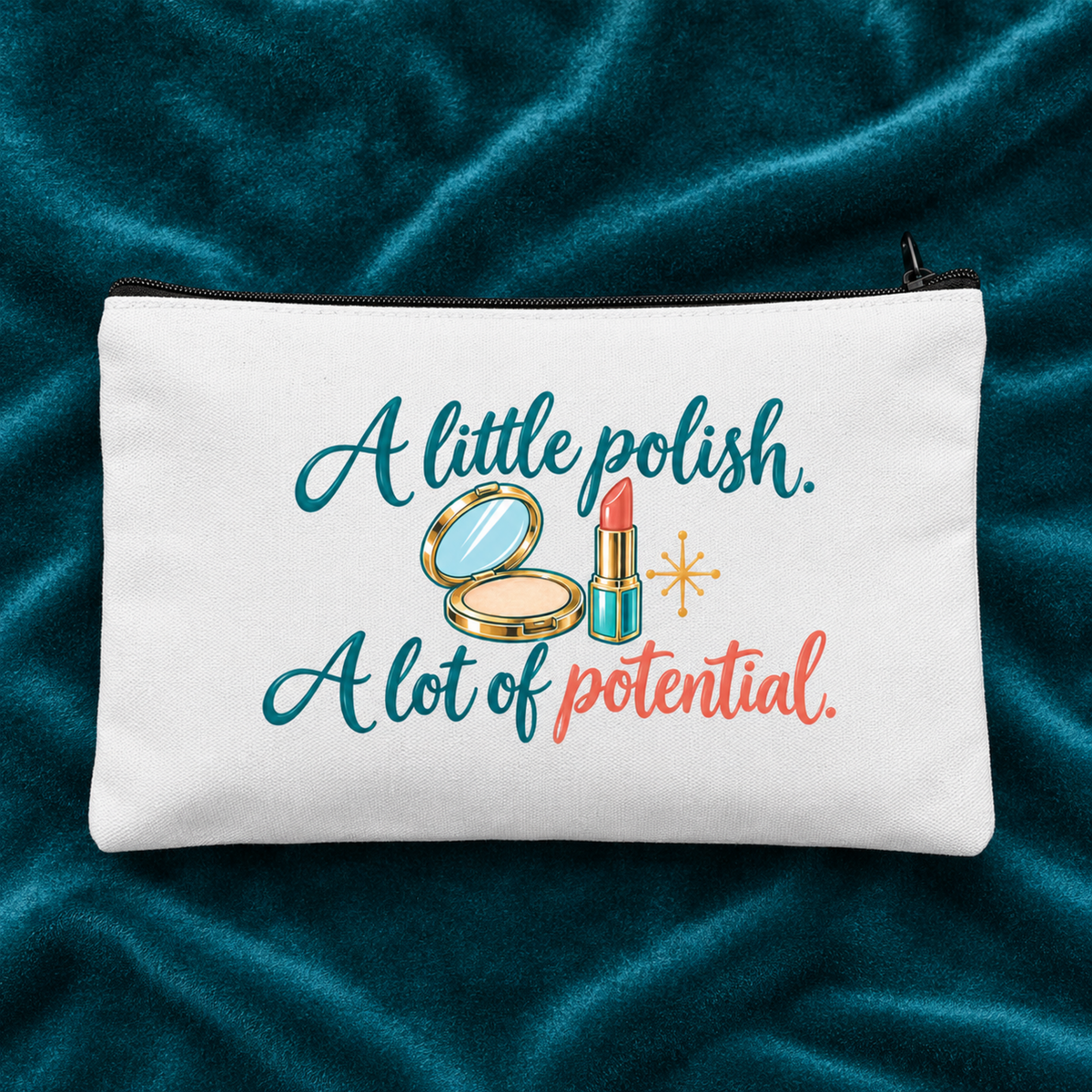 The A Little Polish, A Lot of Potential Makeup Bag by Mirabilia Boutique is a white pouch featuring face powder and lipstick illustrations, plus the phrase in colorful script. Shown resting on dark teal fabric.