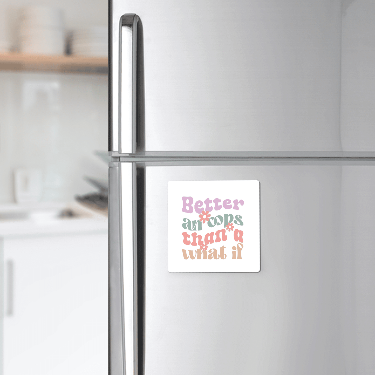 The Better an Oops Magnet by Mirabilia Boutique showcases a retro quote in playful pastels—"Better an oops than a what if"—making it a charming, motivational gift for any kitchen or fridge décor.