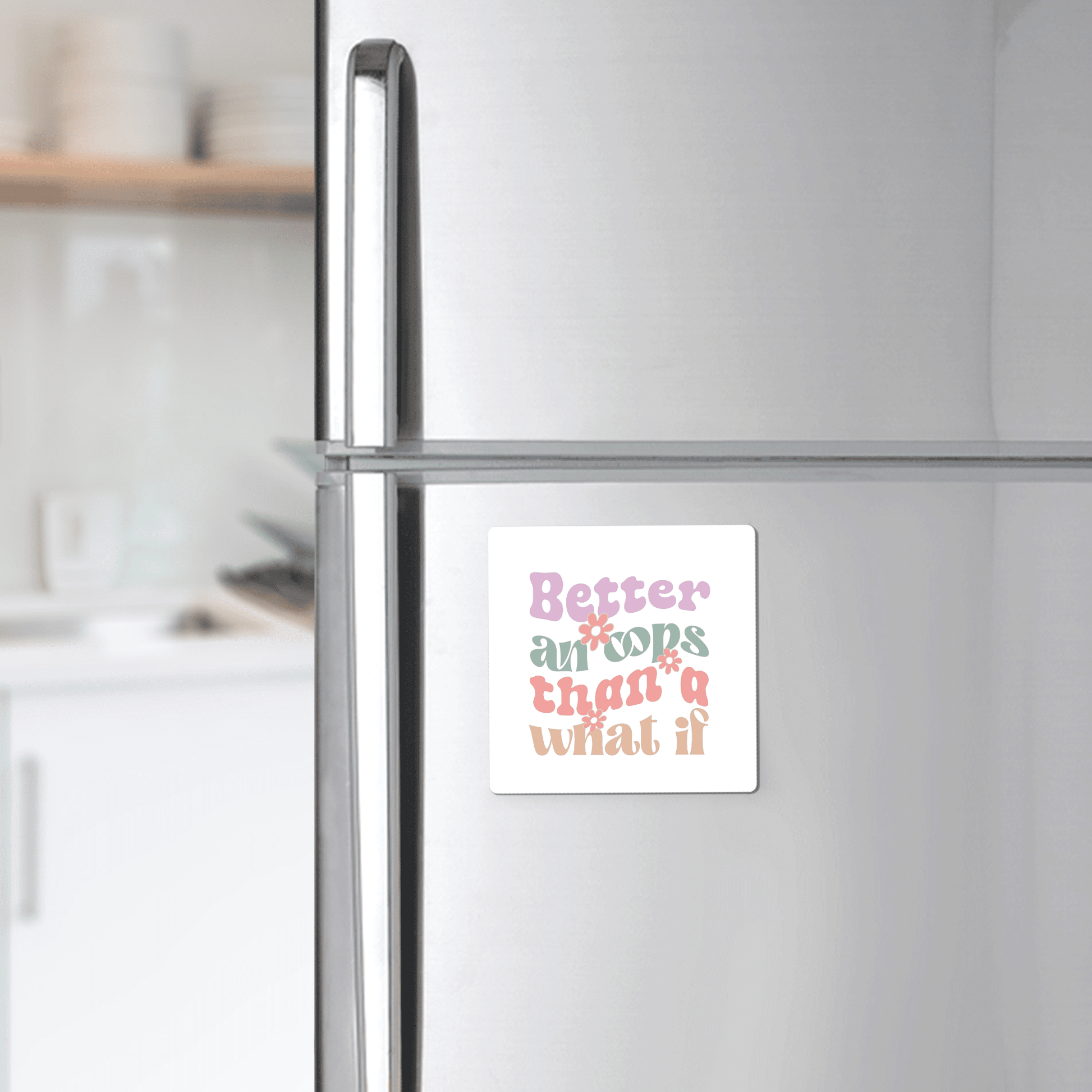 The Better an Oops Magnet by Mirabilia Boutique showcases a retro quote in playful pastels—"Better an oops than a what if"—making it a charming, motivational gift for any kitchen or fridge décor.