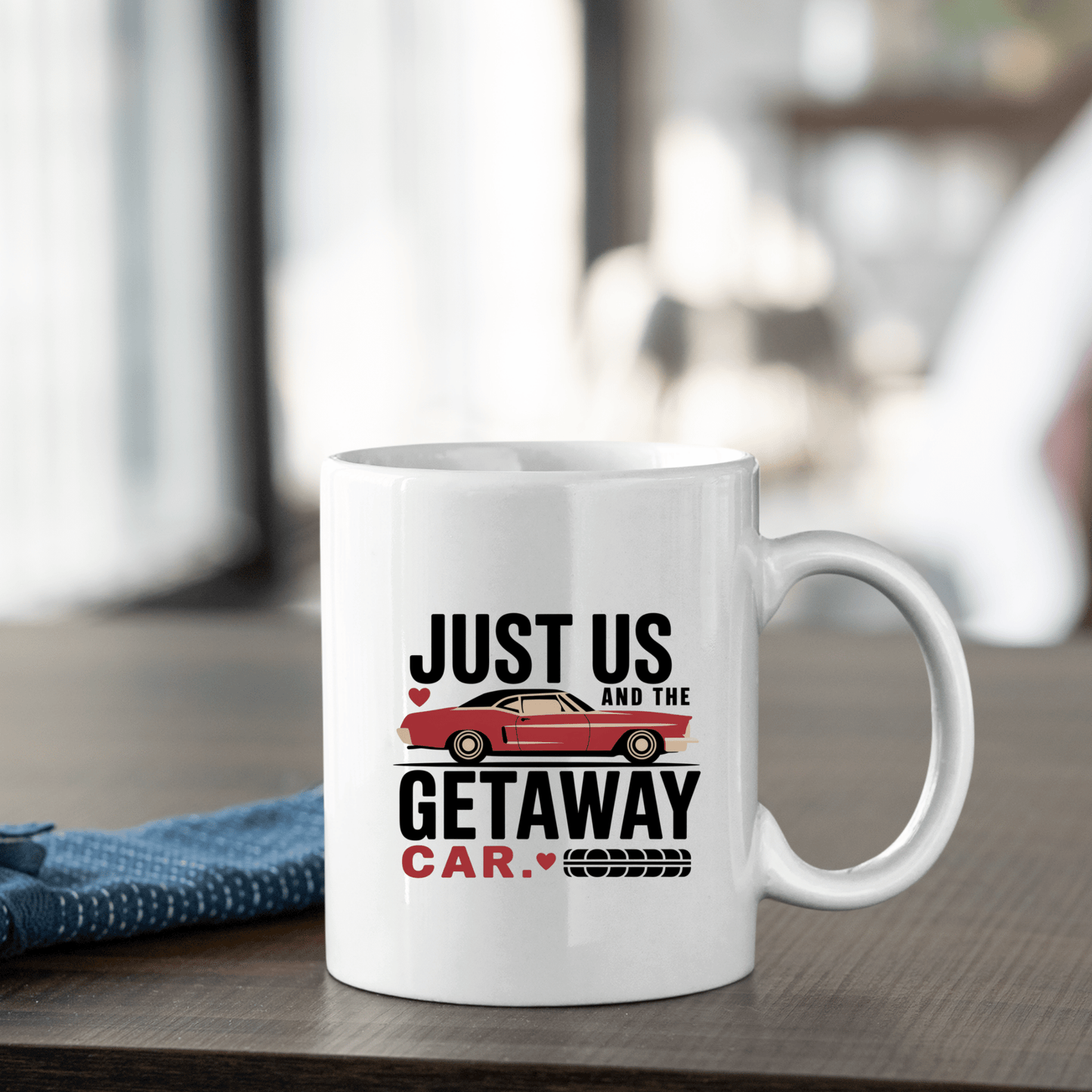 The Romantic Getaway Car Mug by Mirabilia Boutique features “Just us and the getaway car” beside a red car and tire mark, making it a charming, funny couples gift and perfect for romantic moments.