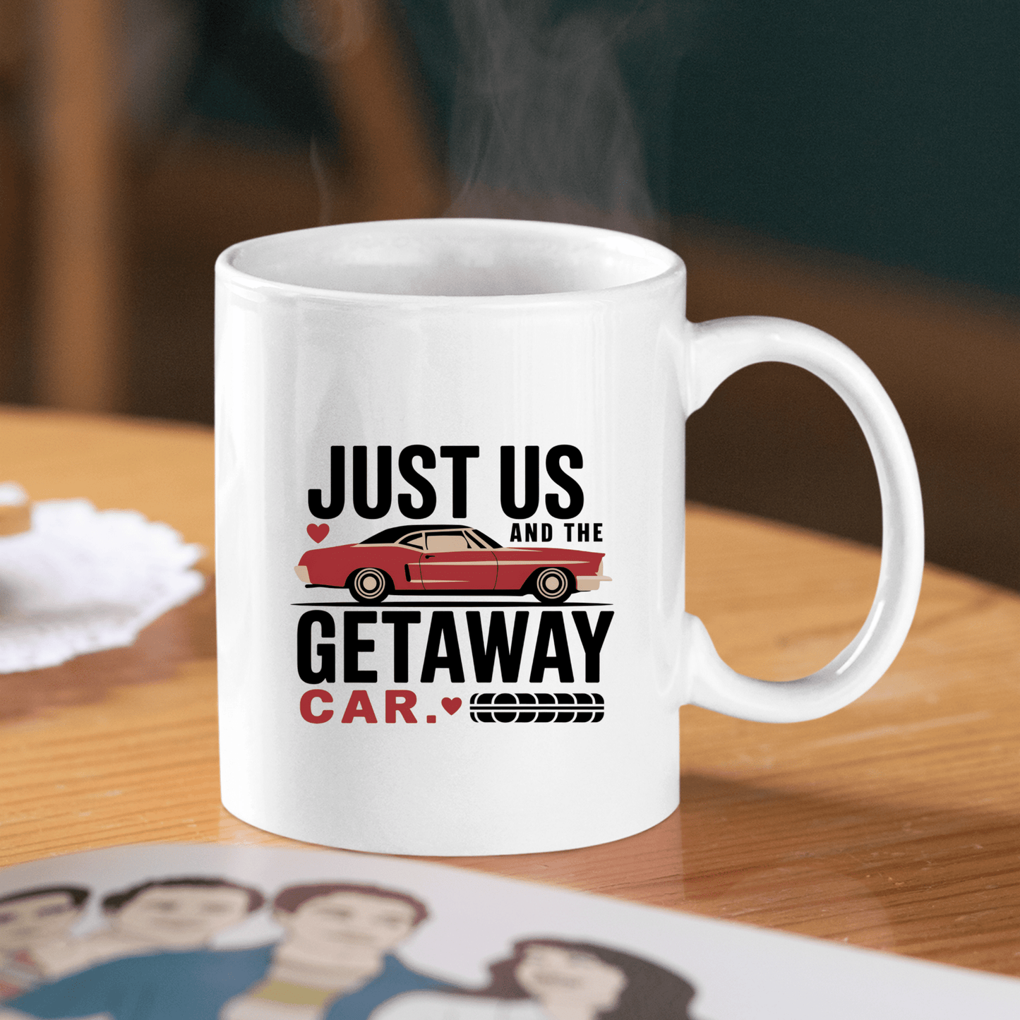 The Romantic Getaway Car Mug by Mirabilia Boutique features a red getaway car and "Just us and the getaway car" in bold black and red letters—an ideal funny couples gift, perfect for a romantic touch to any morning routine.