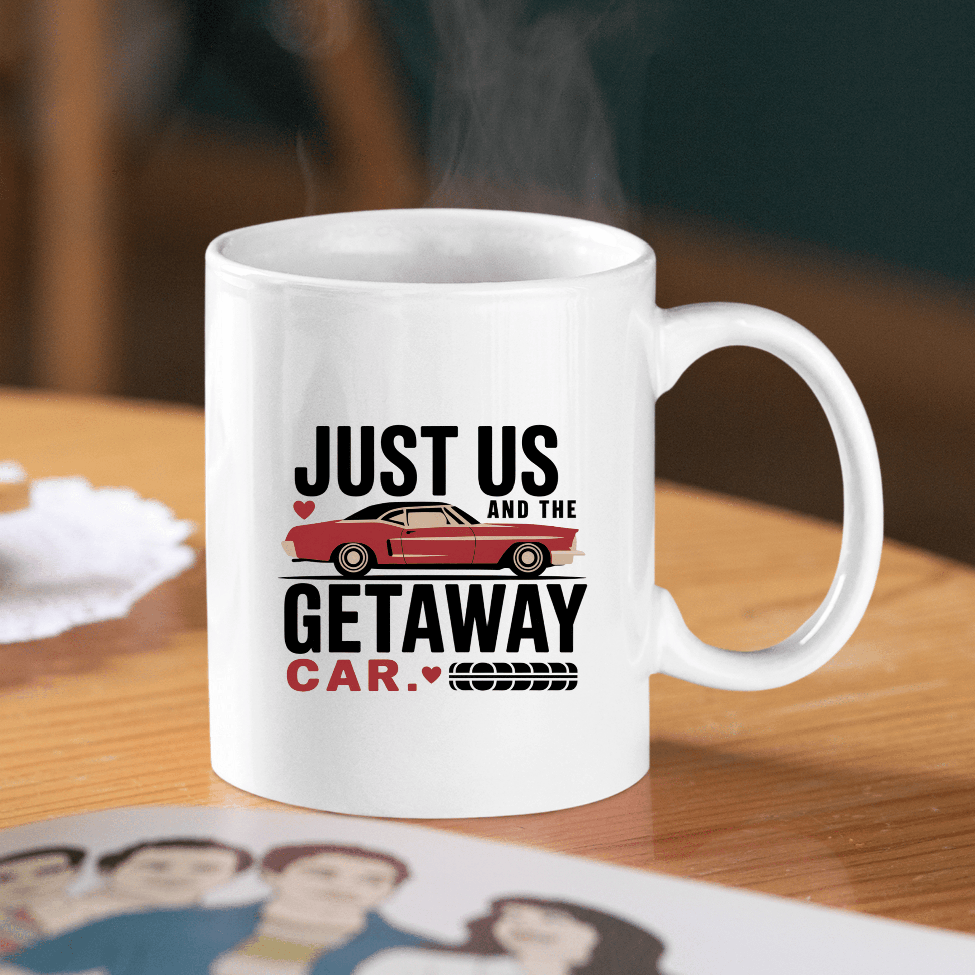 The Romantic Getaway Car Mug by Mirabilia Boutique features a red getaway car and "Just us and the getaway car" in bold black and red letters—an ideal funny couples gift, perfect for a romantic touch to any morning routine.