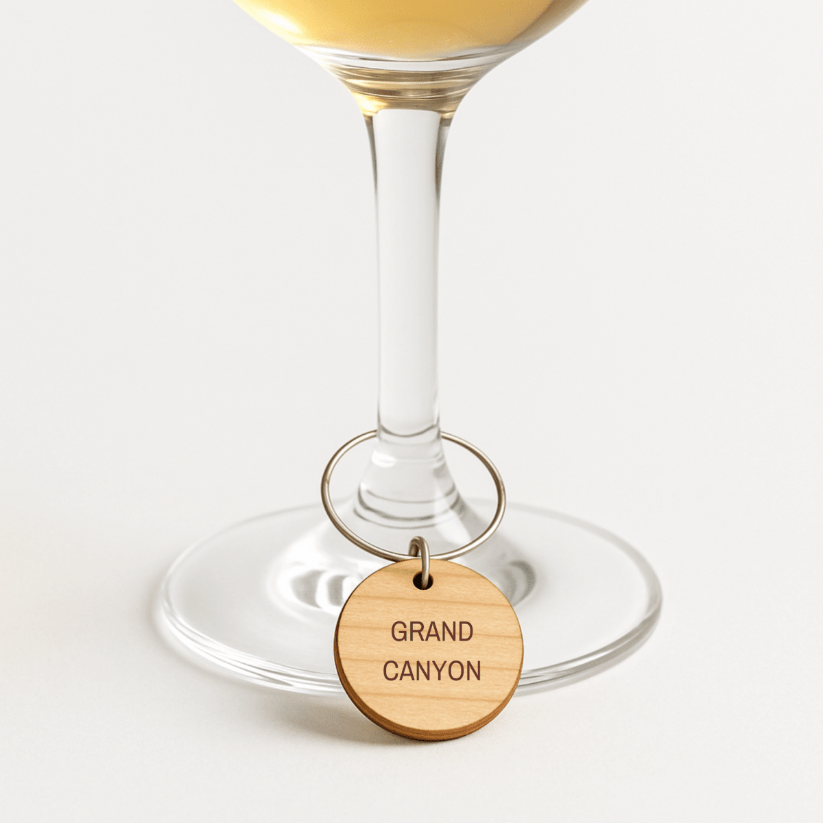 Showcasing the "Grand Canyon" charm from Mirabilia Boutique’s Southwest National Park Wine Charms Set—an ideal gift for national park lovers and wine charm collectors.