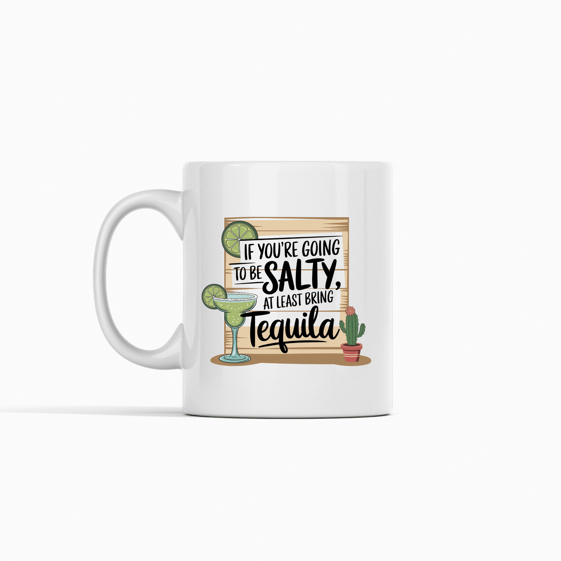 The Mirabilia Boutique Salty Tequila Mug is a white coffee cup featuring a cute cactus and the funny saying, "If you're going to be salty, at least bring tequila." Perfect for margarita lovers!.