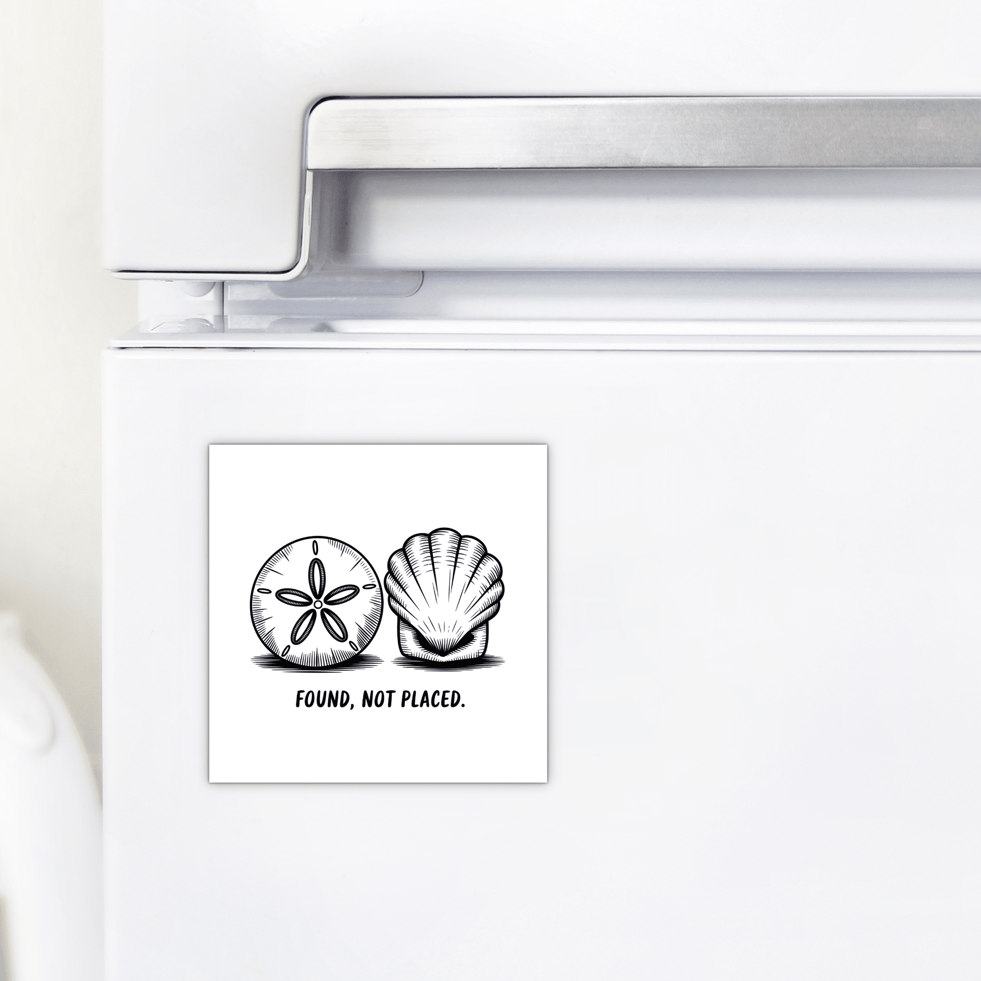 The Found, Not Placed Magnet – Minimalist Coastal Quote by Mirabilia Boutique features hand-drawn sand dollar and seashell art with the phrase "FOUND, NOT PLACED."—a stylish square magnet for beach-inspired decor.