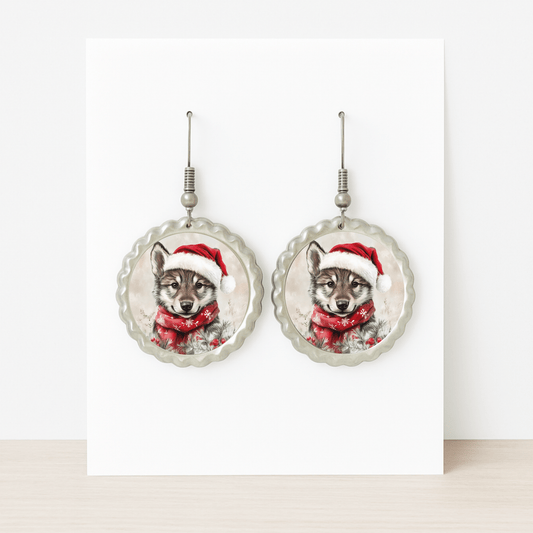 Mirabilia Boutique’s Santa Wolf Earrings are round woodland Christmas jewelry featuring a wolf pup in a Santa hat and scarf—perfect hypoallergenic holiday accessories for festive celebrations.