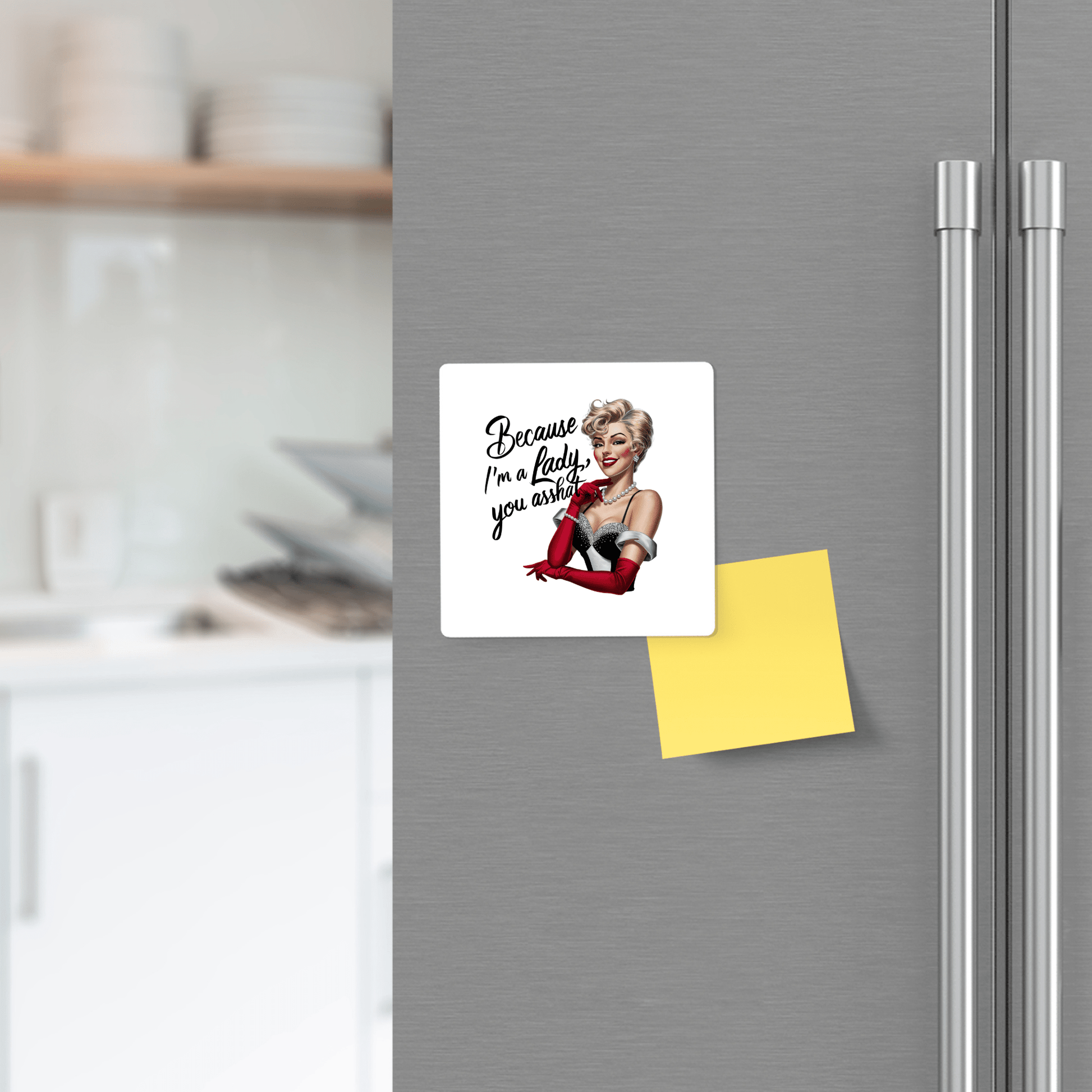 On a refrigerator door, the Mirabilia Boutique "Because I'm a Lady" retro UV fridge magnet—an ideal funny gift for women or friends—features an unapologetic woman in red gloves and the phrase “Because I’m a lady, you asshole!”.