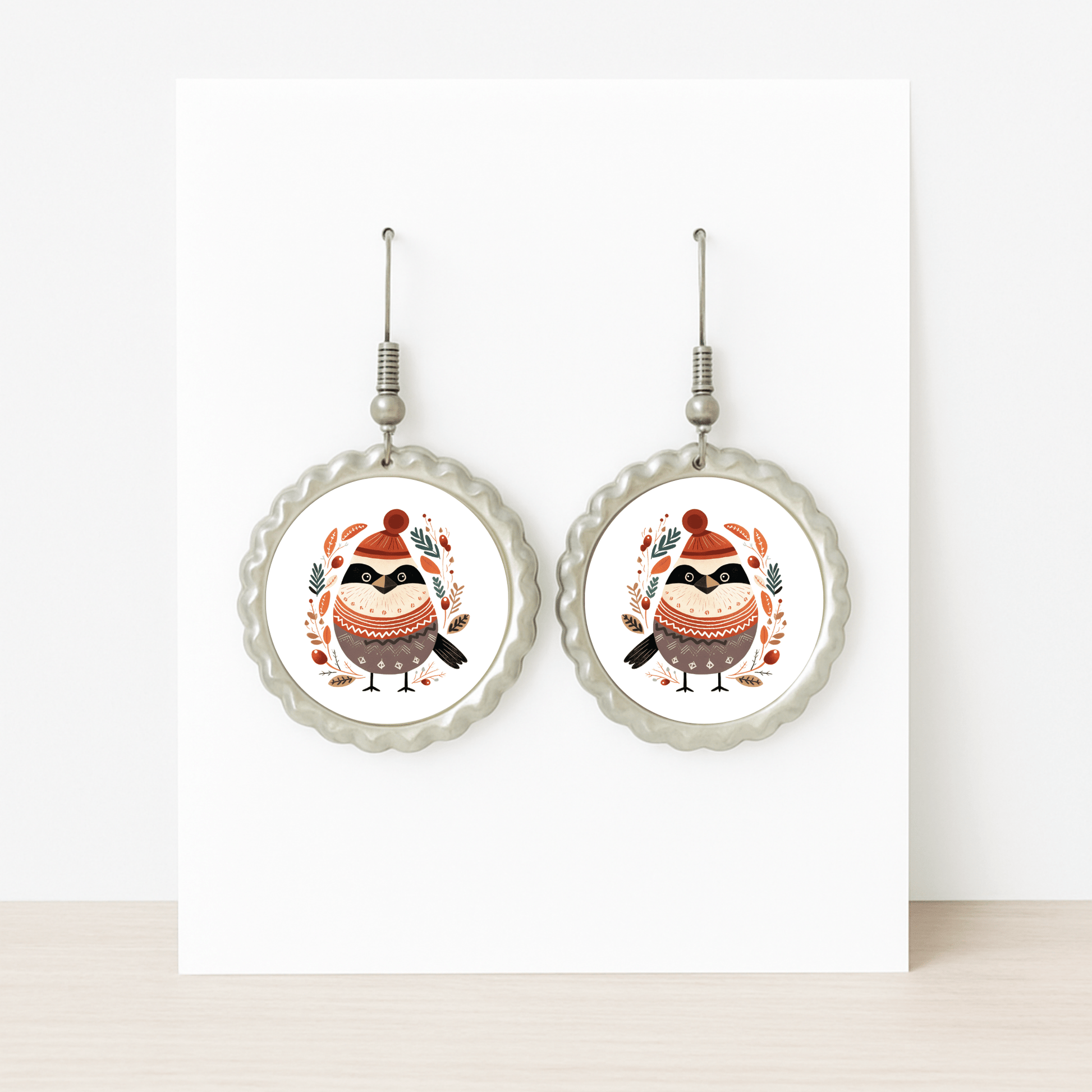 Mirabilia Boutique’s Scandi Christmas Bird Earrings feature hypoallergenic round studs with a festive bird and autumn leaves—a perfect hygge holiday accessory for fans of Scandinavian winter style.
