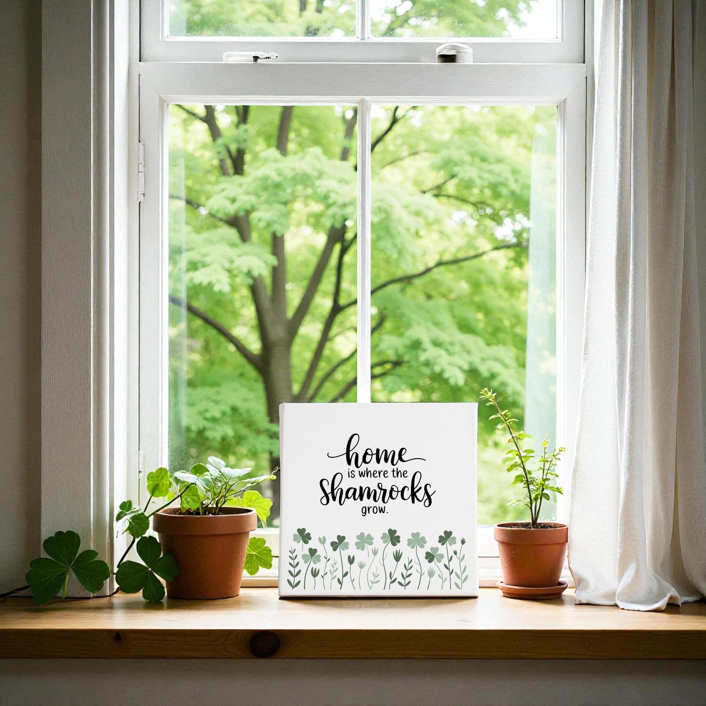 The "Home Is Where the Shamrocks Grow Canvas" by Mirabilia Boutique features a white-framed window with potted shamrocks and a heartwarming sign—a perfect Irish home decor accent for any room.