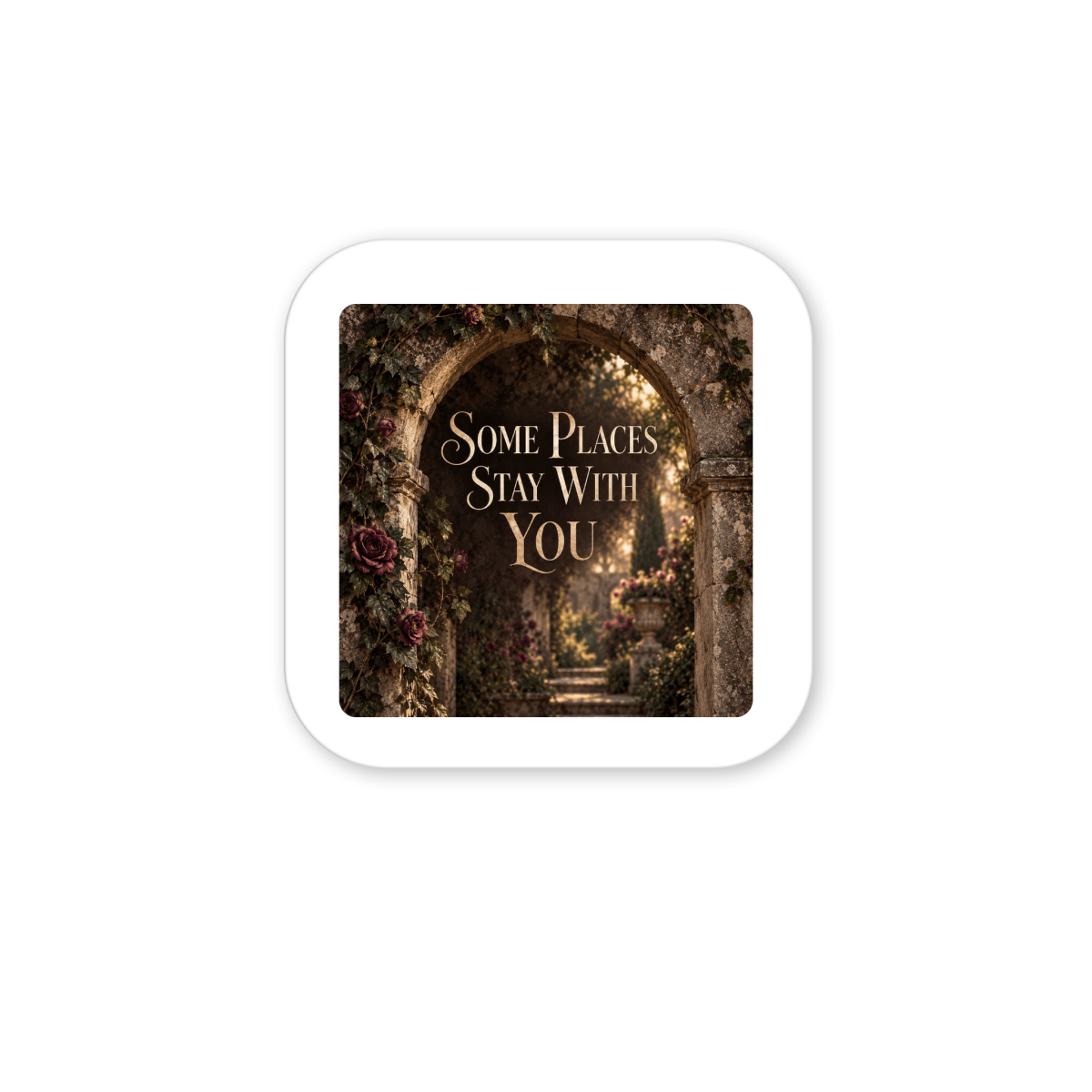 The Some Places Stay With You Magnet | Velvet Ruins by Mirabilia Boutique features an arched stone doorway adorned with flowers and the phrase “Some Places Stay With You” at its center, making it a charming keepsake and thoughtful gift for any refrigerator.