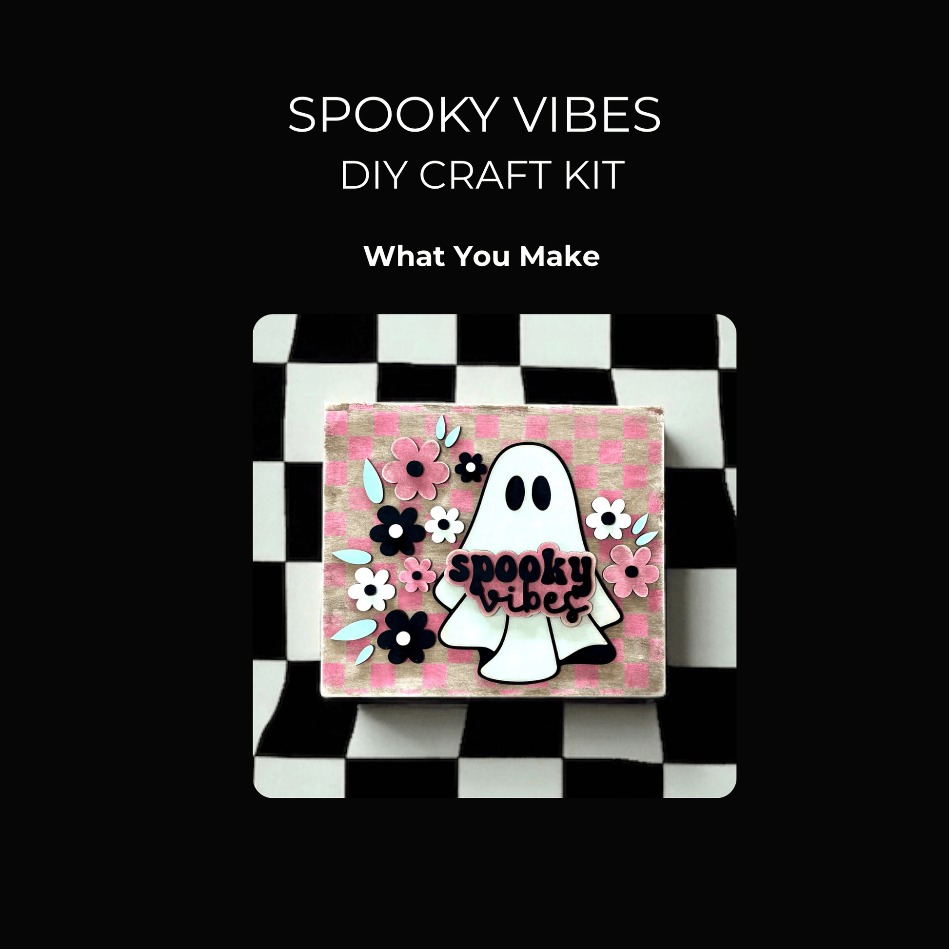 The Spooky Vibes Paint Kit by Mirabilia Boutique is a DIY Halloween ghost sign featuring pink and black flowers, a cute ghost, and "spooky vibes" text—perfect for crafters looking to create festive decor!.