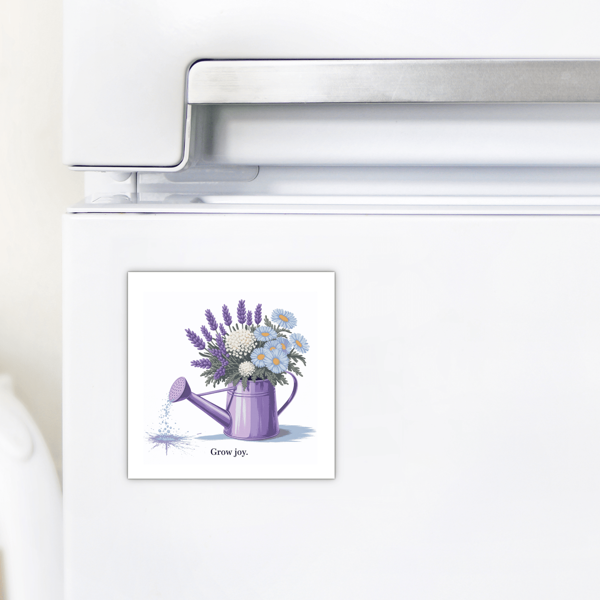 The Grow Joy Magnet – Watering Can & Soft Garden Florals by Mirabilia Boutique features a purple watering can with flowers and "Grow joy." on a square design, making it a charming gift for gardeners or floral kitchen decor lovers.