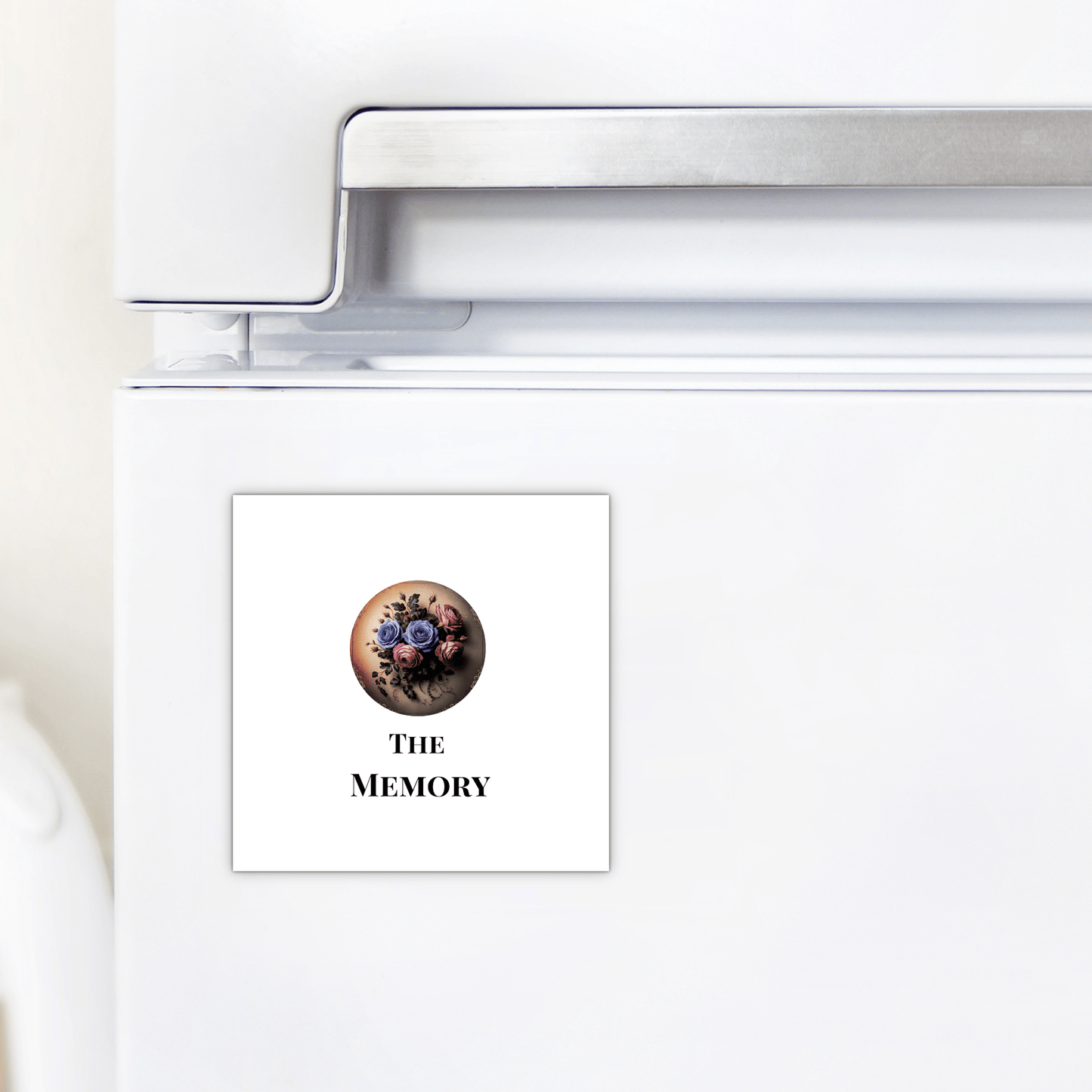 A white fridge door with Mirabilia Boutique’s "The Memory | Dead Regency Magnet"—a square gothic floral magnet featuring "The Memory," perfect for subtle dark decor.