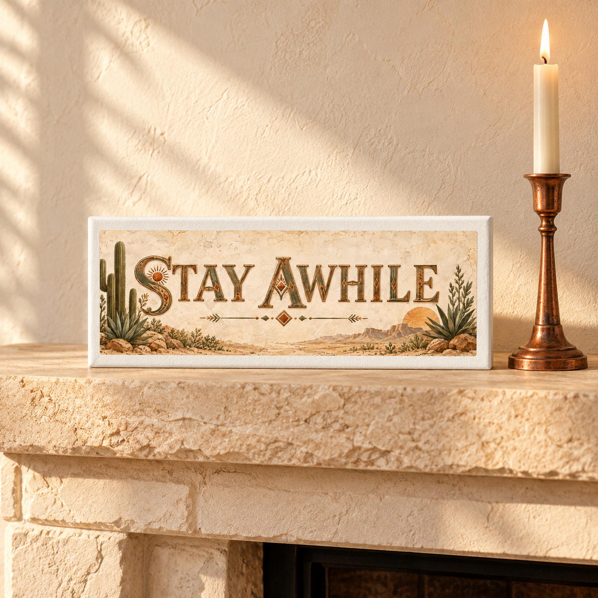 The Stay Awhile Desert Shelf Sitter | Sage & Stone by Mirabilia Boutique adds southwestern charm to your mantel, featuring desert plants beside a candle and sunlit beige walls.