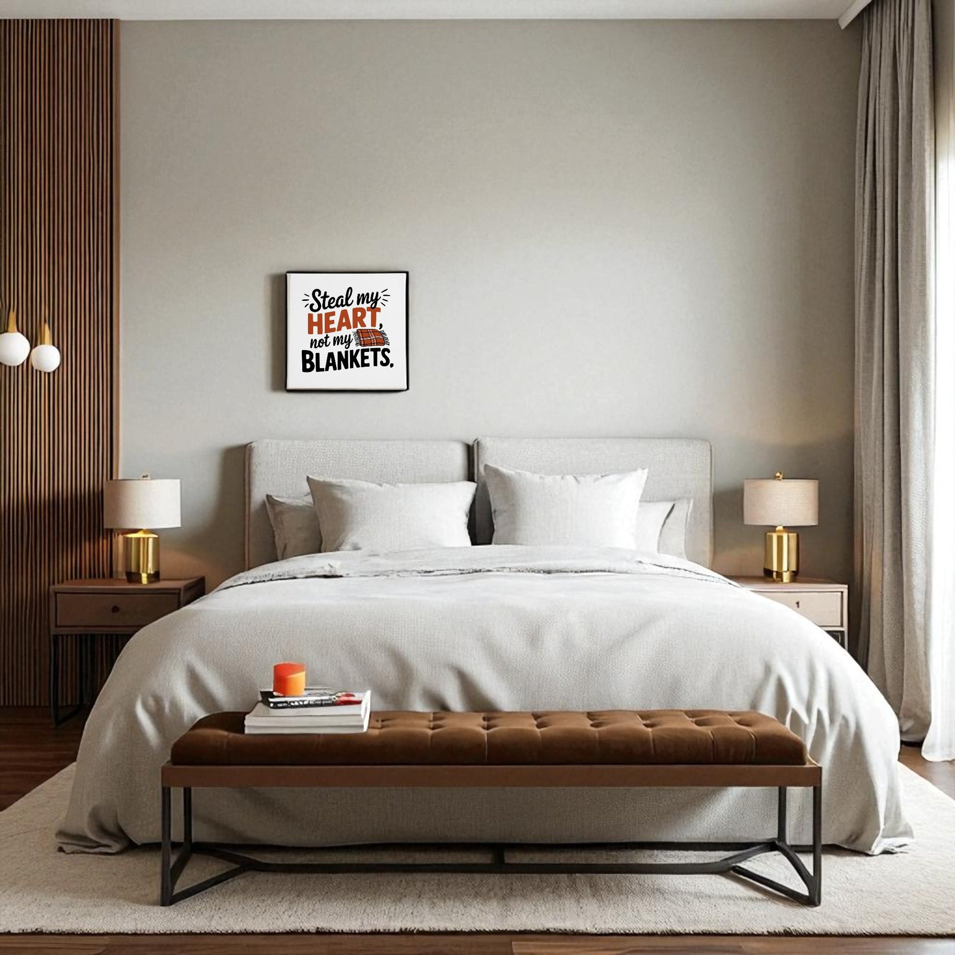 A modern bedroom features a large bed with white bedding, chic decor, two bedside tables with lamps, a brown bench, and the Mirabilia Boutique "Steal My Heart Not My Blankets" 8x8 canvas sign—a perfect couples’ gift.