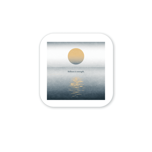 The Stillness Is Strength Magnet by Mirabilia Boutique features a minimalist design with a yellow sun over a blue sea and the inspiring text, "Stillness is strength." Ideal for mindful gifting or bringing calm to any space.